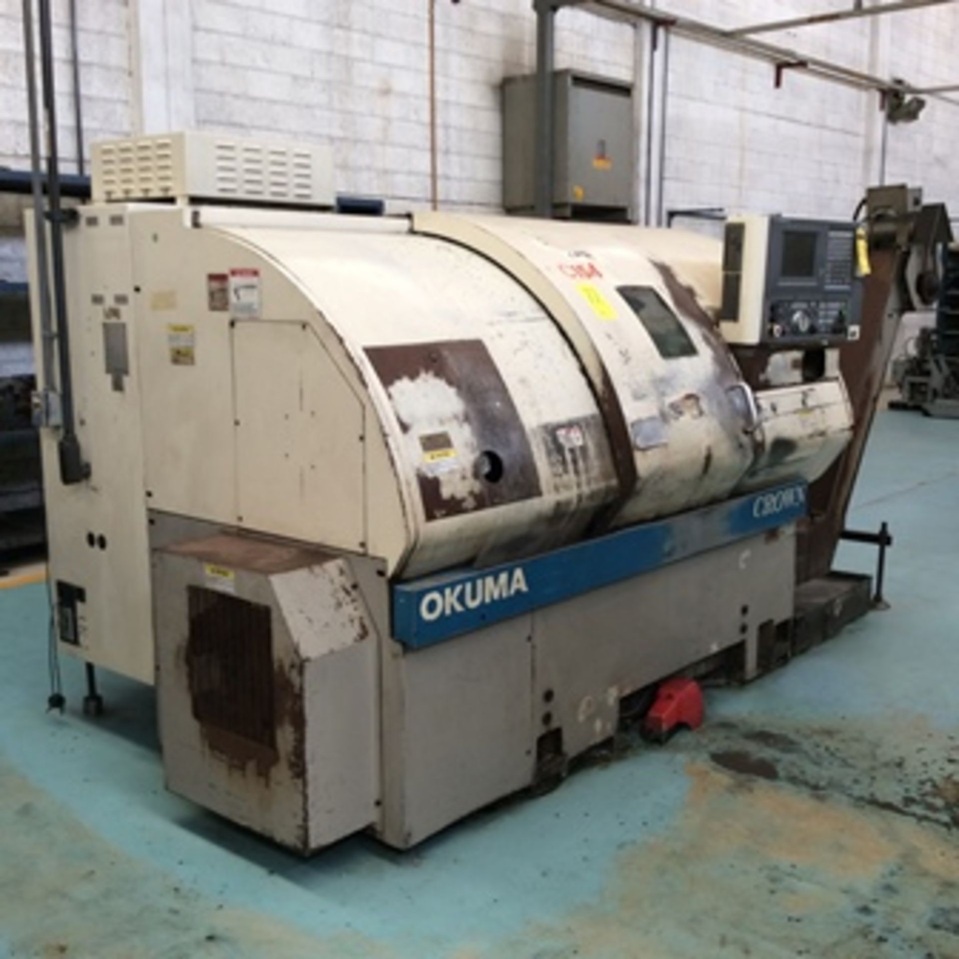 Okuma Crown CNC Lathe model 762S-BB 0270 series with 12 tools turret and chip collector … - Image 10 of 10