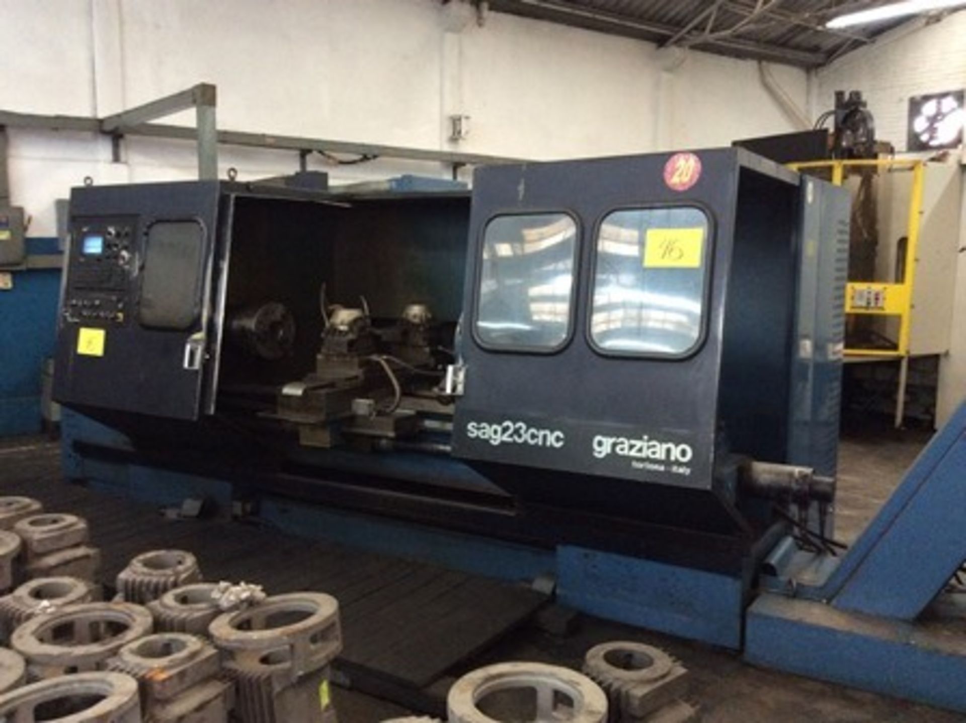 CNC Torno marca Graziano mod. Sag23CNC, doble torreta de 4 portaherramientas, volteo de 63 cm y 2.0