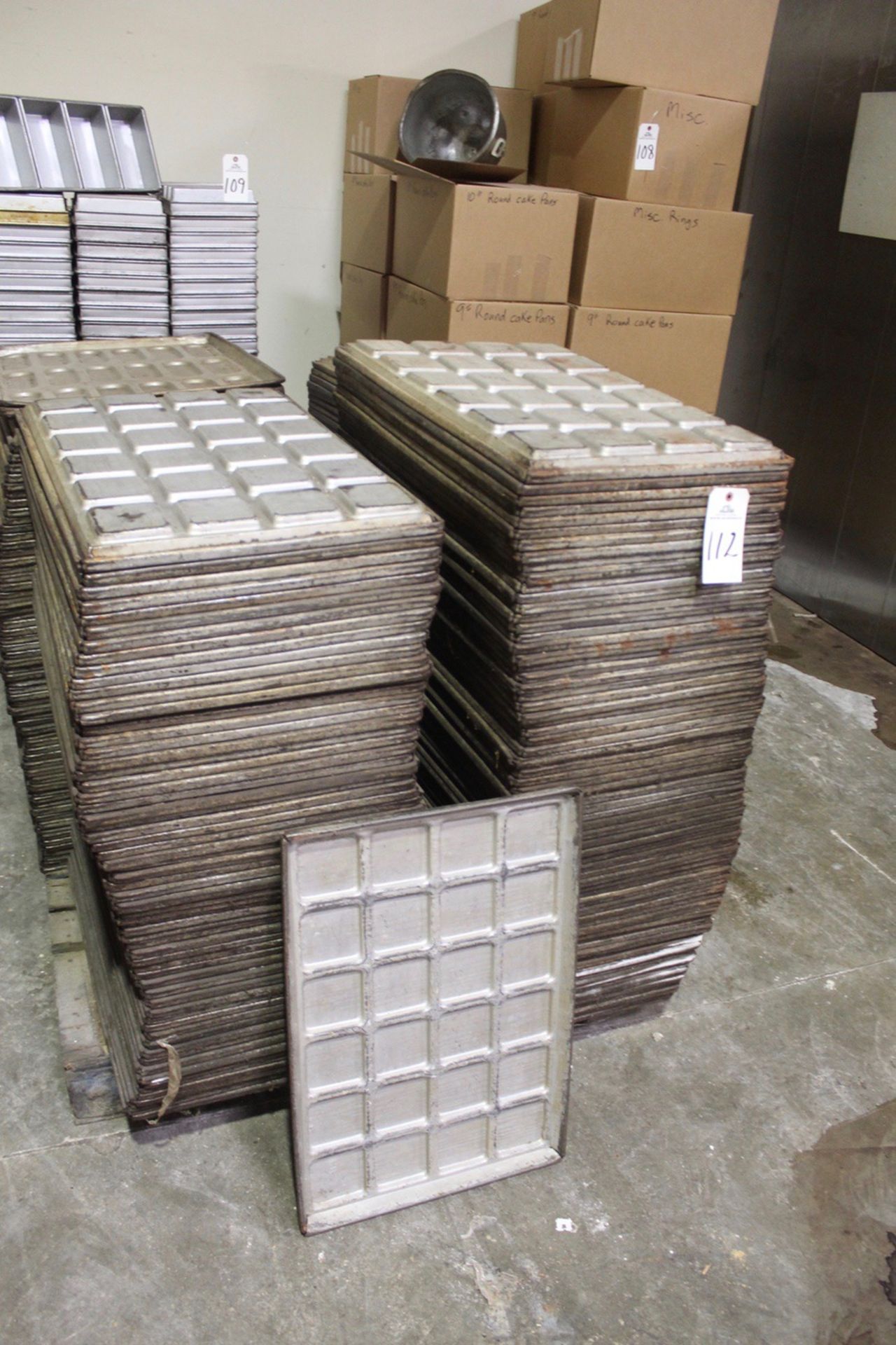 Lot of Baking Pans, (232) 24 Pocket, 3.5" X 3.5" X .5" | Rigging and Loading Fee: Hand Carry Or