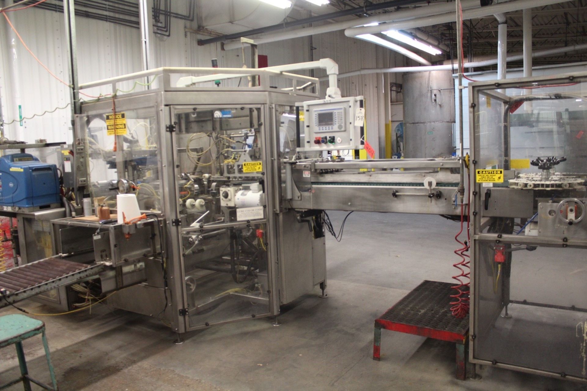 SWF 4 Oz. Case Packer, W/ Box Erector, Stager & Controls | Subject to Bulk 149B | Rigging: $4200