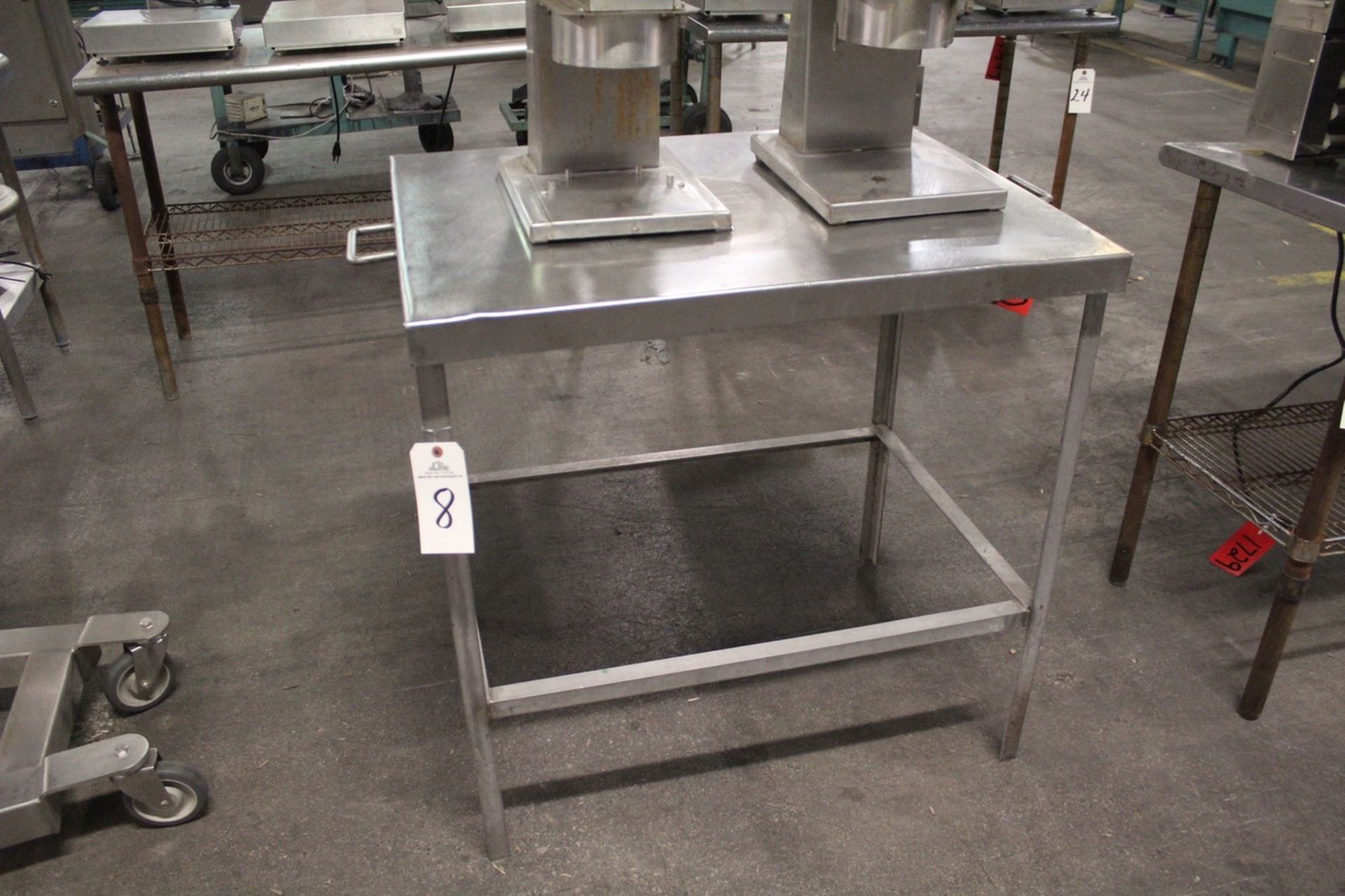 Stainless Table, 27" x 35" | Rigging: $10