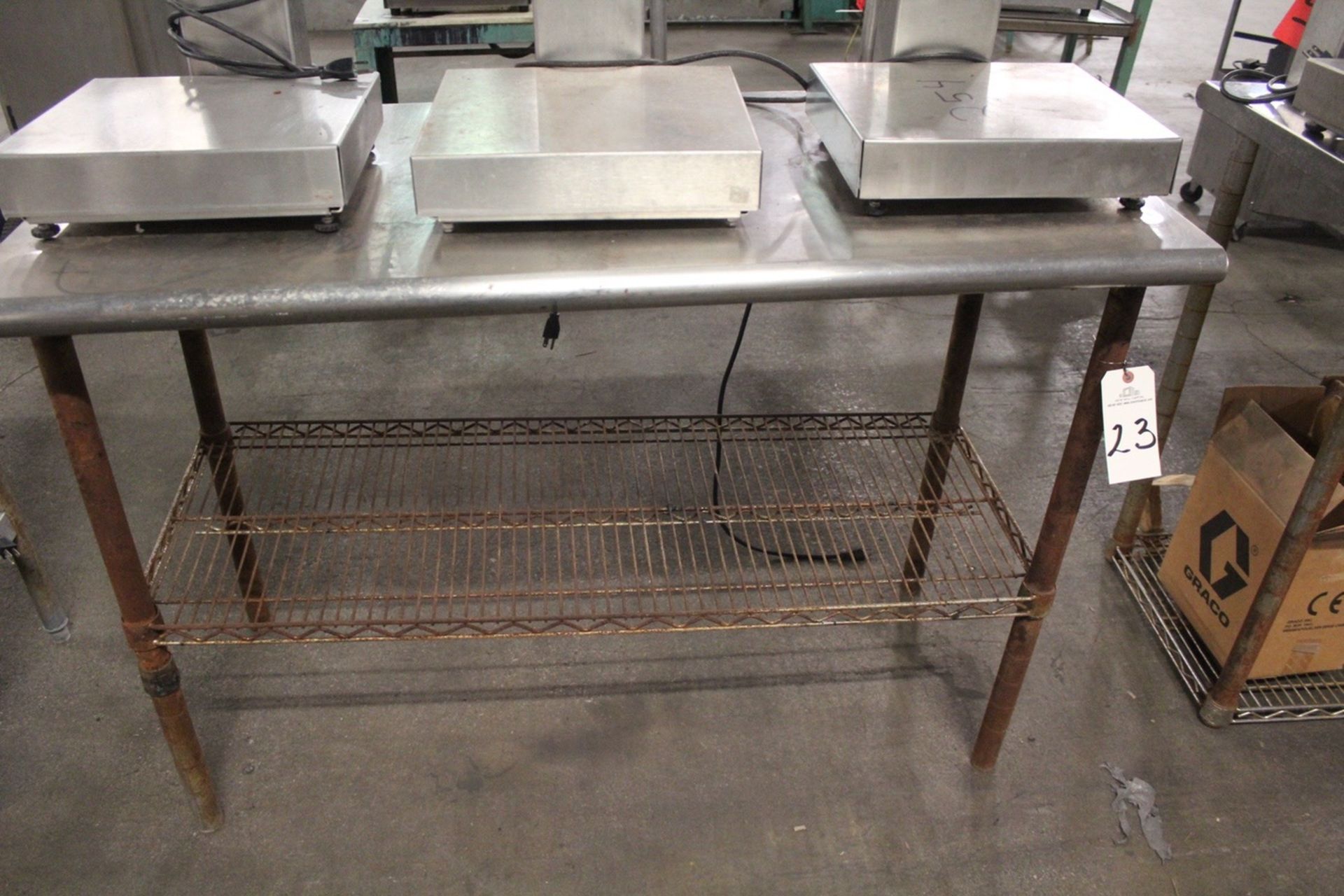 Stainless Table, 24" x 50" | Rigging: $10