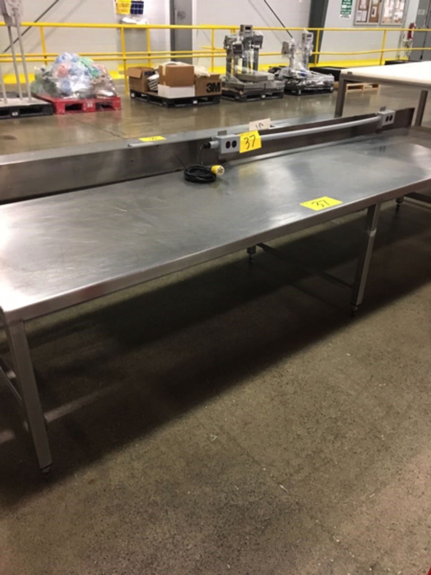 STAINLESS STEEL 30"X10'X22"H PREP ROOM TABLE W/2 - 100V RECEPTICLES | RIGGING/LOADING FEE: $15