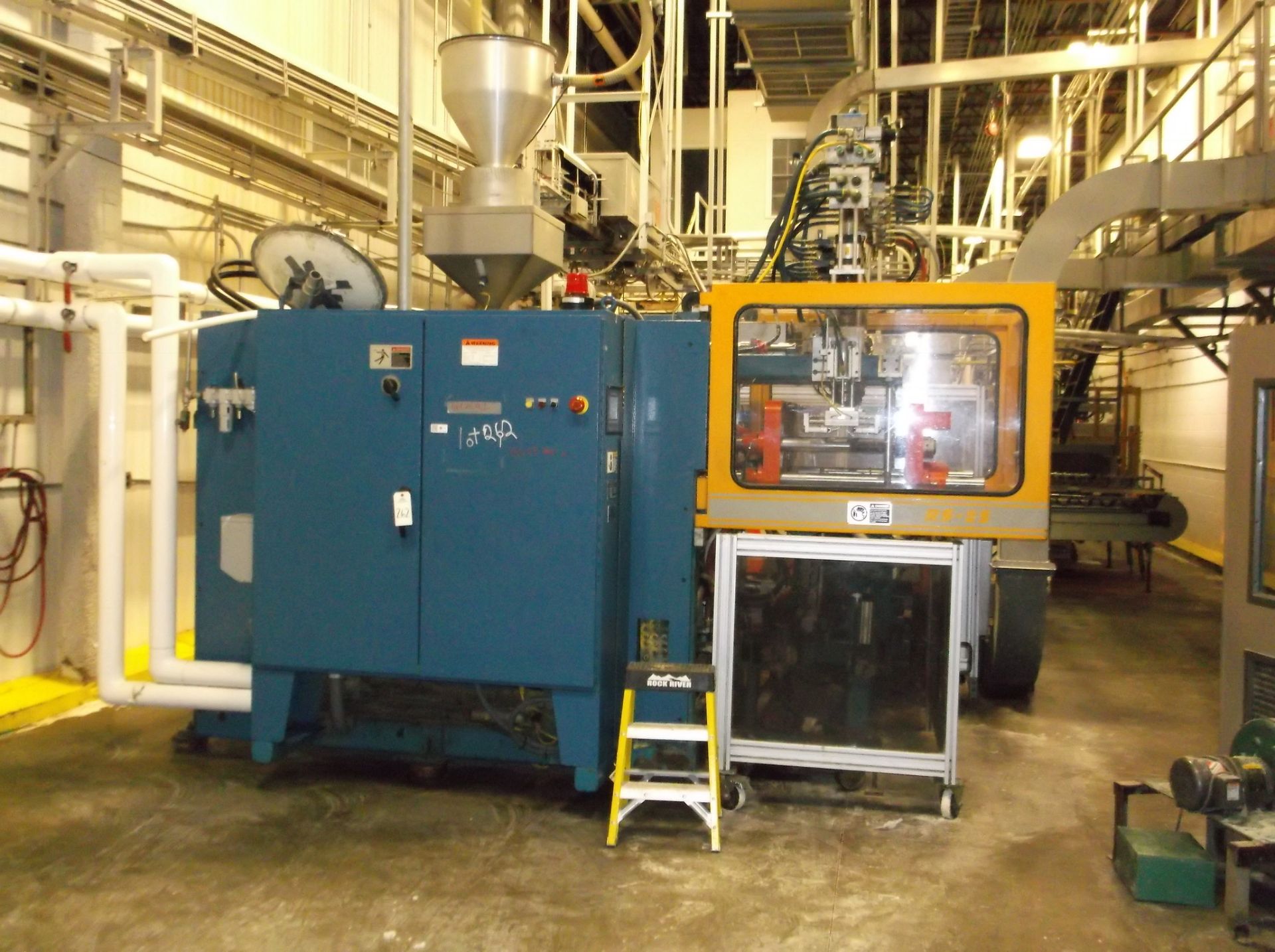 Rocheleau Blow Molding system with trim table and leak detection | Rigging/Loading Fee: $7000