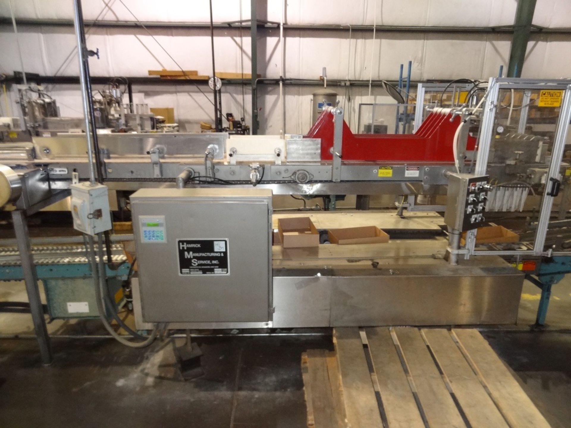 Hamrick 300 Model D Fully Automatic Drop Packer, w/drop heads | Rigging Fee: $1000