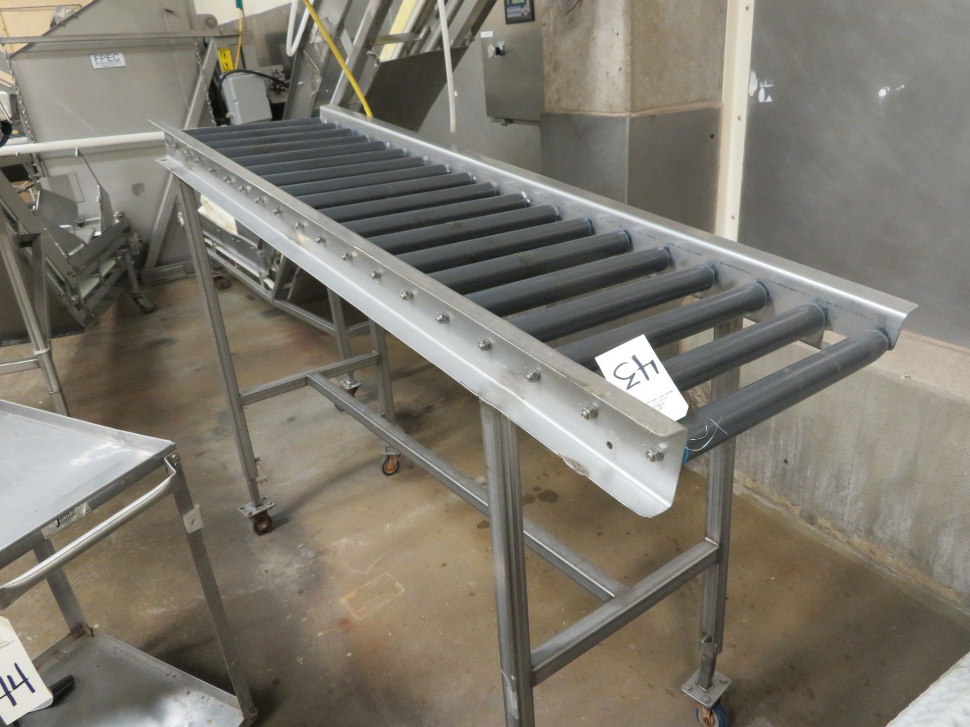 Jamco Stainless Steel Frame Roller Conveyor, 19"W x 74"L | Rigging Fee: $50