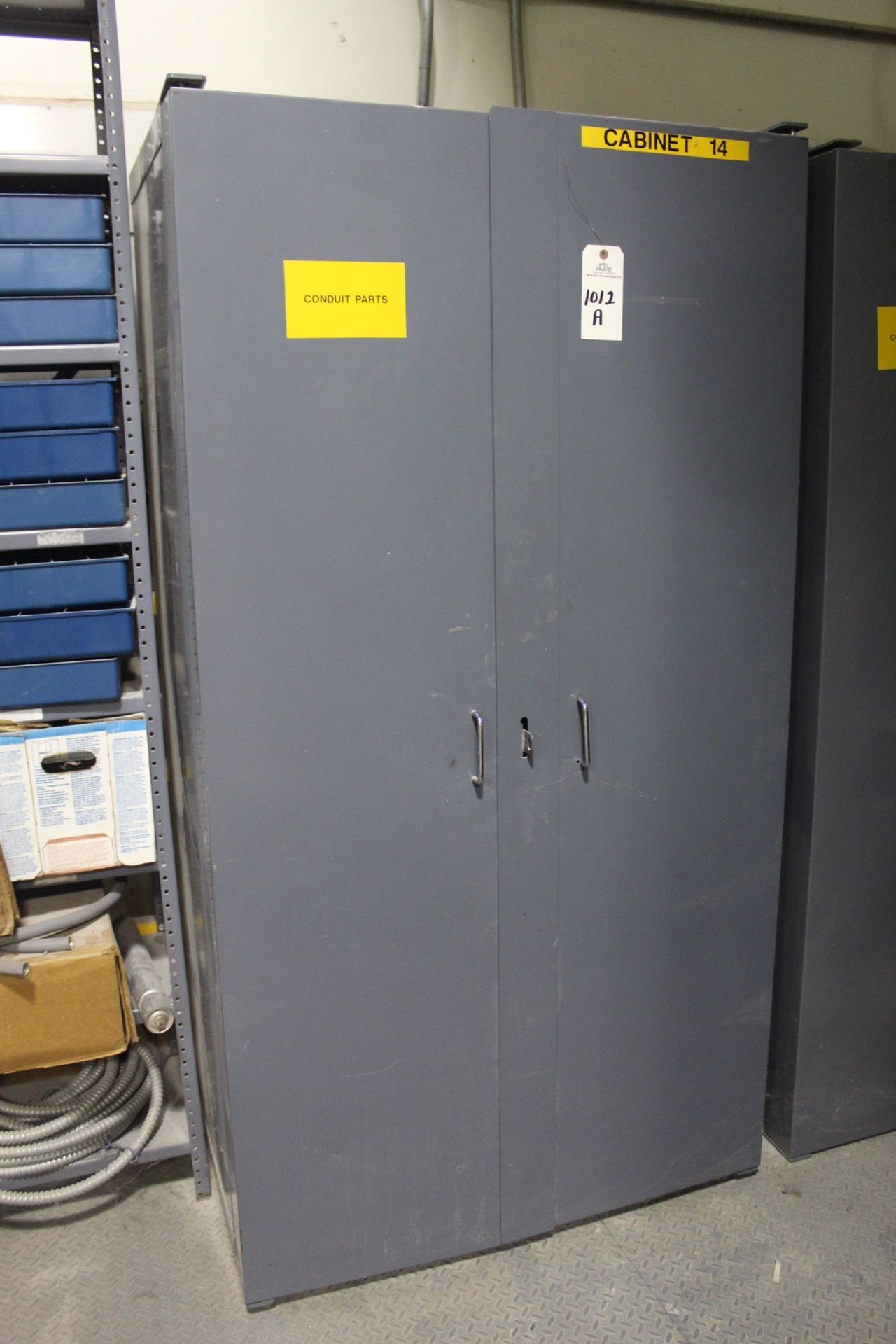 Two Door Storage Cabinet w/Contents | Rigging Fee: $35