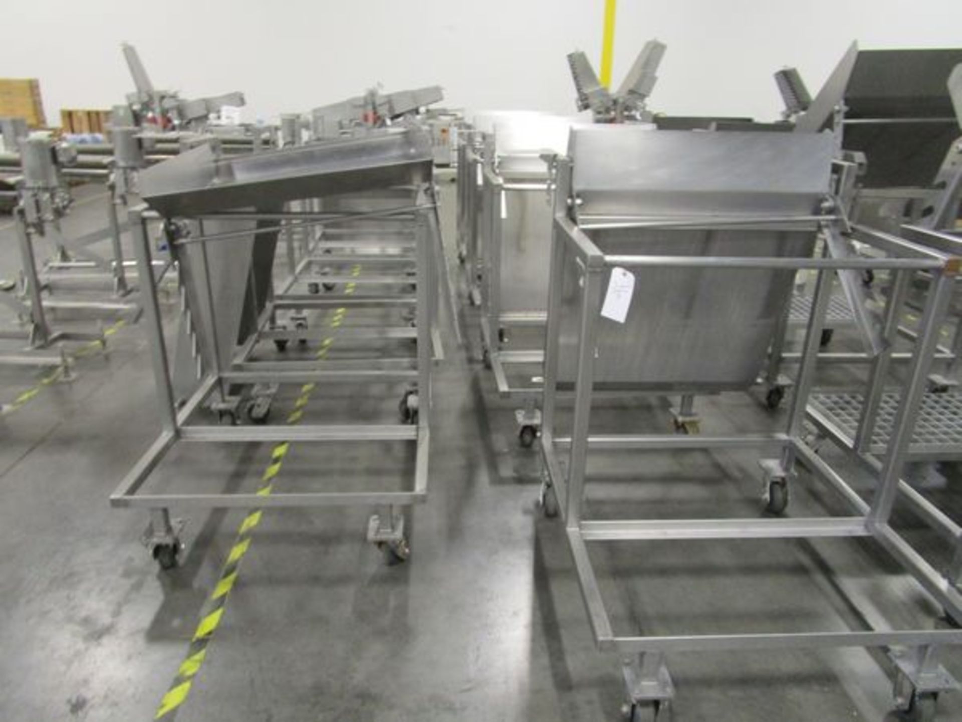 Lot (9) Stainless Steel Portable Packaging Stands (Missing 1 Tray, No Grates | Rigging Fee: $250