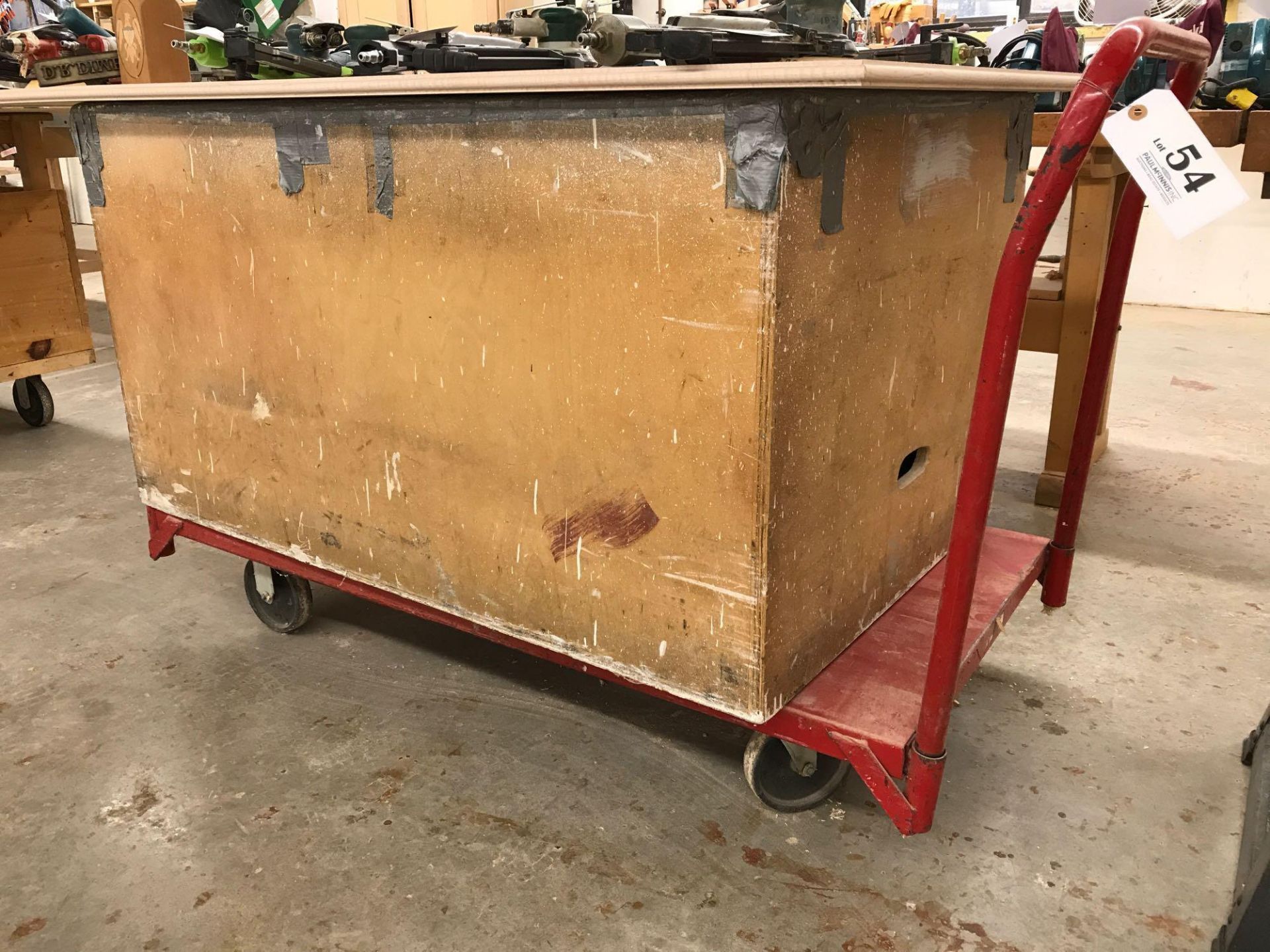 Red rolling metal cart and box