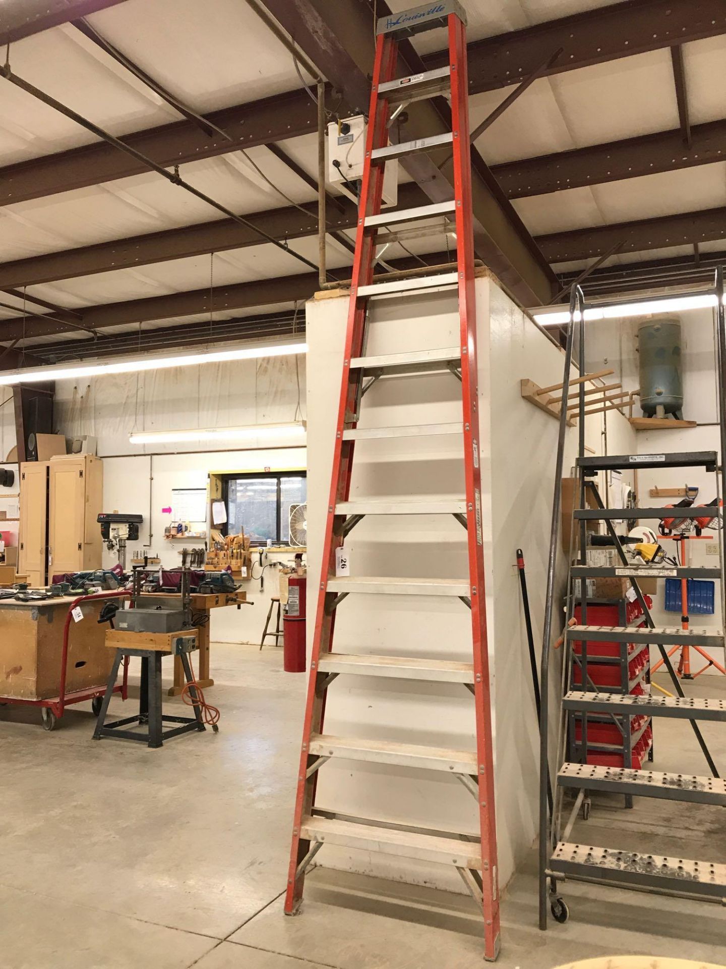 12' fiberglass A-frame ladder. Delivery of this lot to the buyer will not occur prior to 4:00 p.m. o