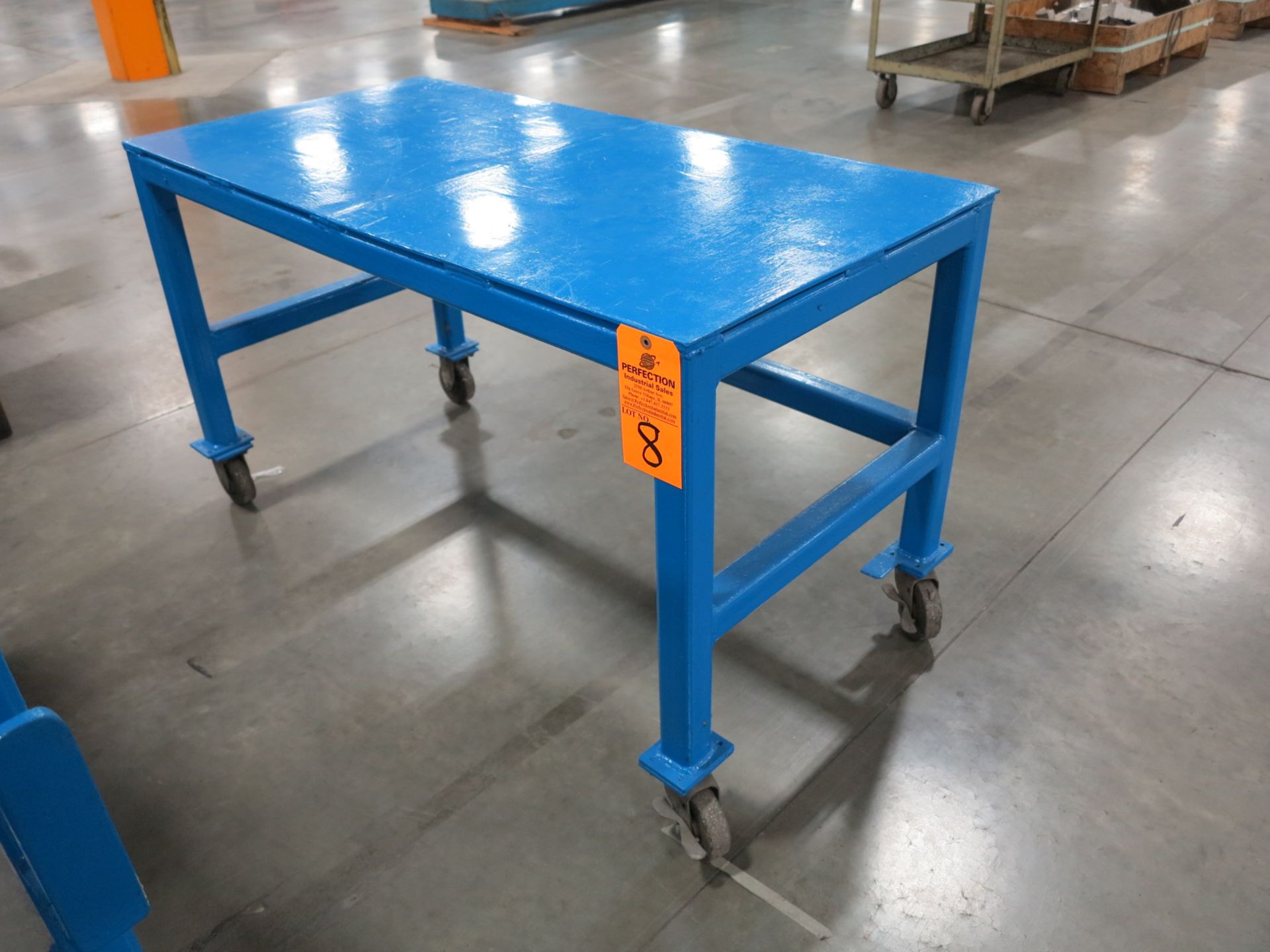 Metal Table on Casters, 42" x 24" x 28"