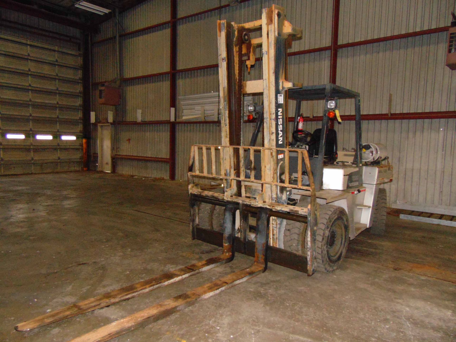 FORKLIFT, NISSAN 15,000 LB. CAP. MDL. 15-5, dual LPG system, 14,280 lbs. @ 24” L.C., 2-stage mast,