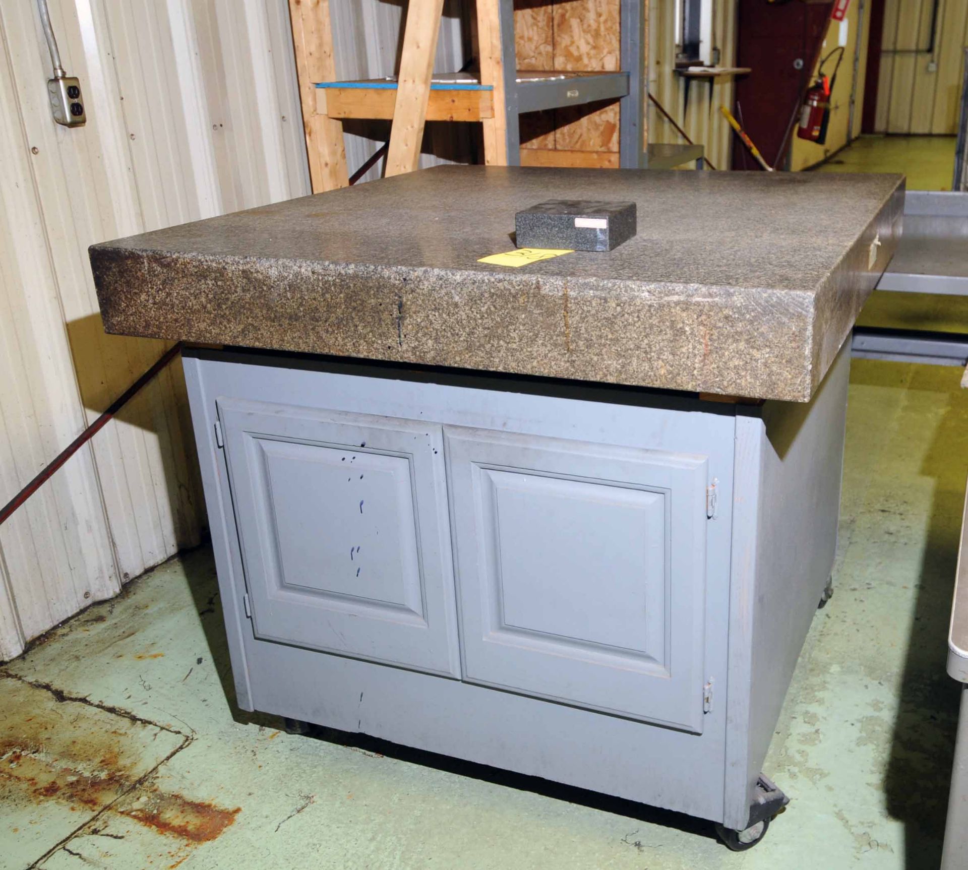 GRANITE SURFACE PLATE, 48” x 48” x 6” thk., wood cabinet base, on casters (Sold by photo. Located