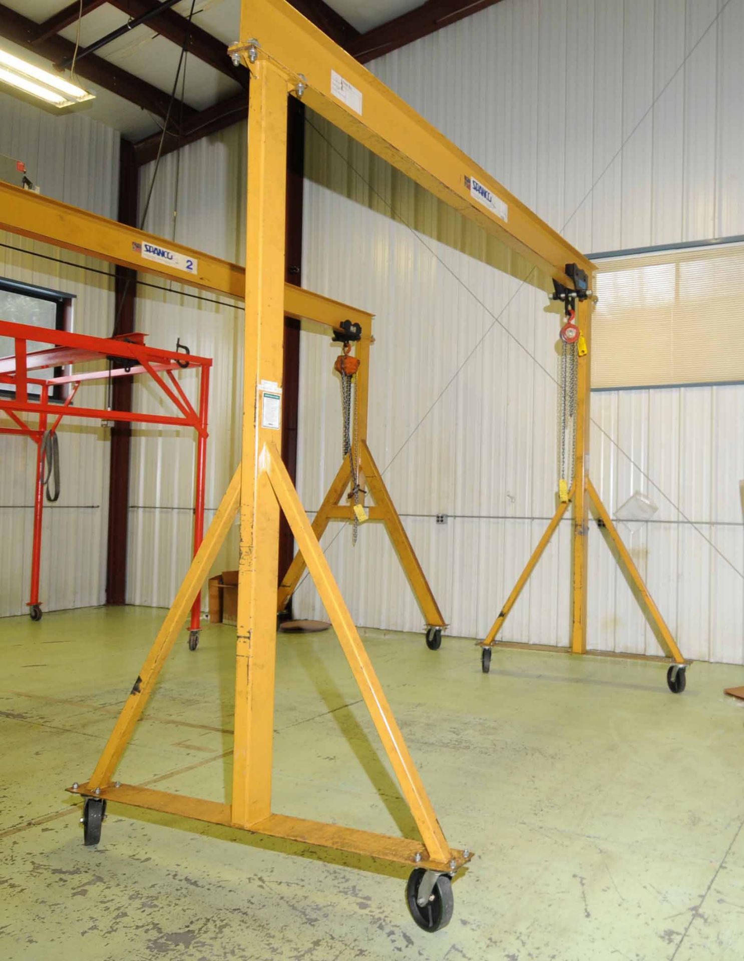 ROLLING GANTRY CRANE, SPANCO 2 T. CAP., 128”L., approx. 7’ under hook (Sold by photo. Located