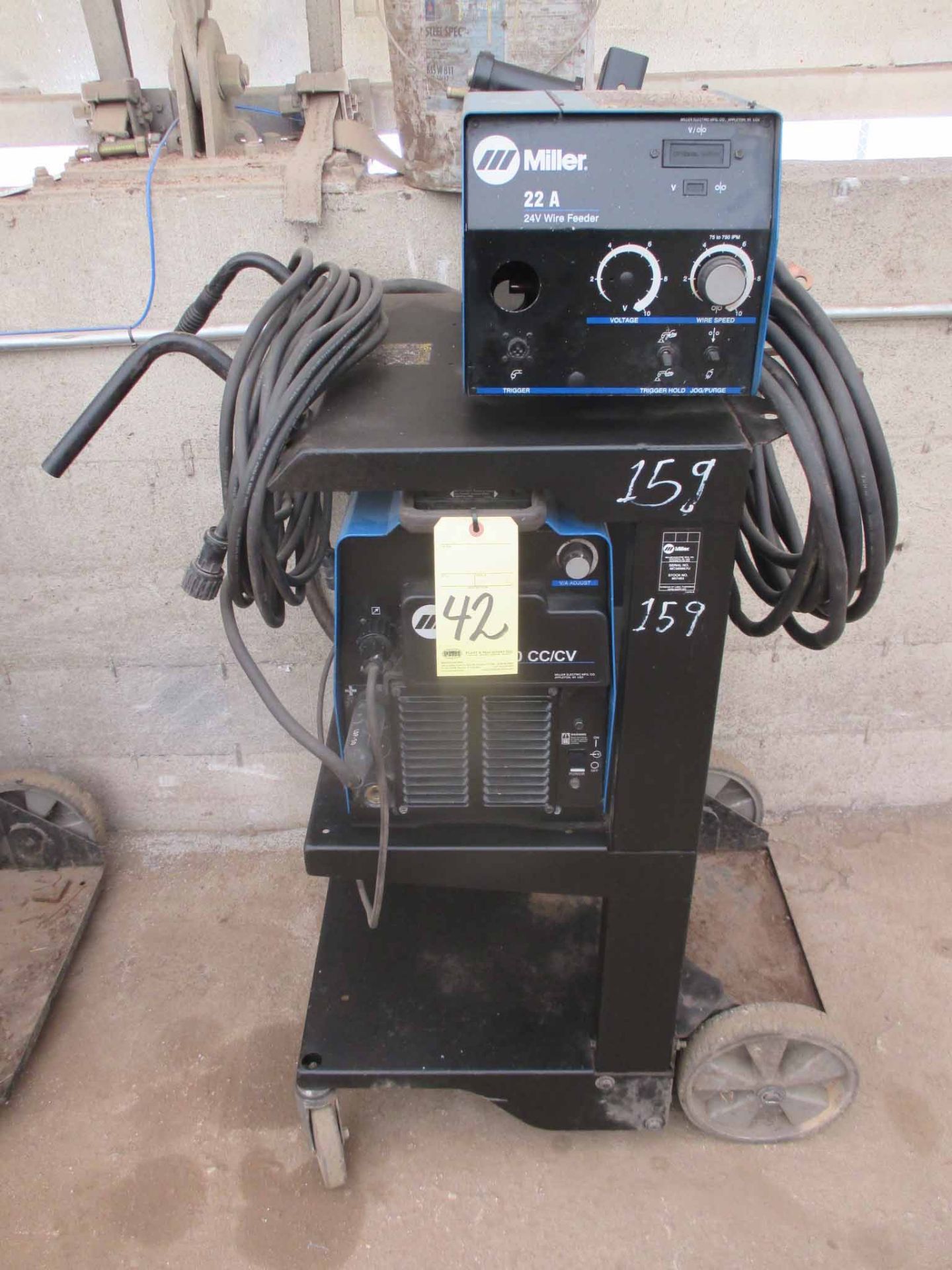 MIG WELDER, MILLER MDL. XMT350, 350 amps @ 34 v., 60% duty cycle, running gear, Miller 22A wire