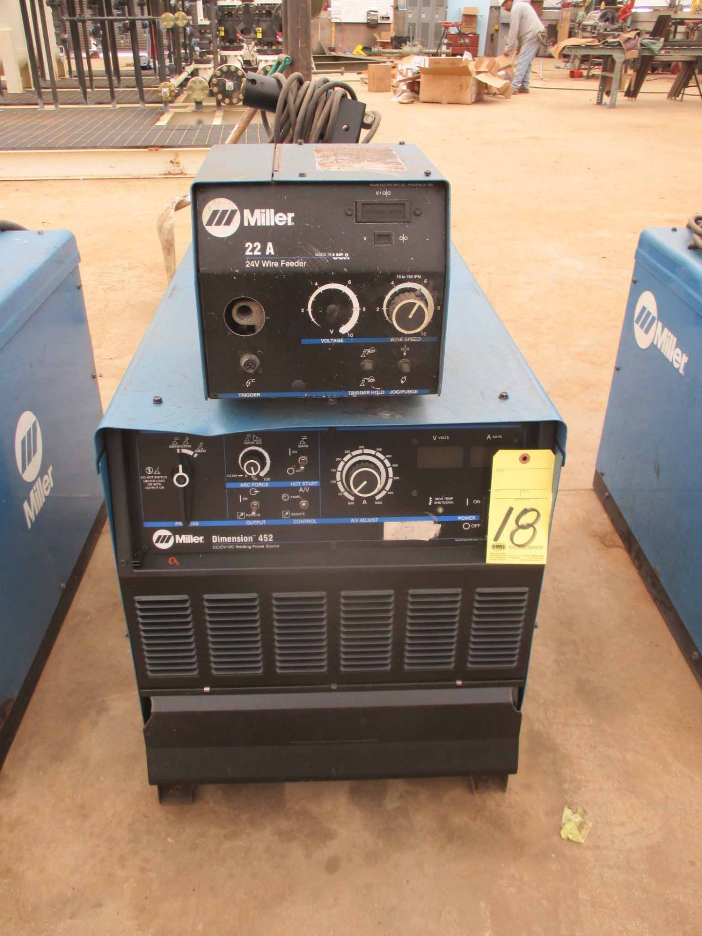 MIG WELDER, MILLER MDL. DIMENSION 452, 450 amps @ 38 v., 100% duty cycle, Miller 22A variable spd.