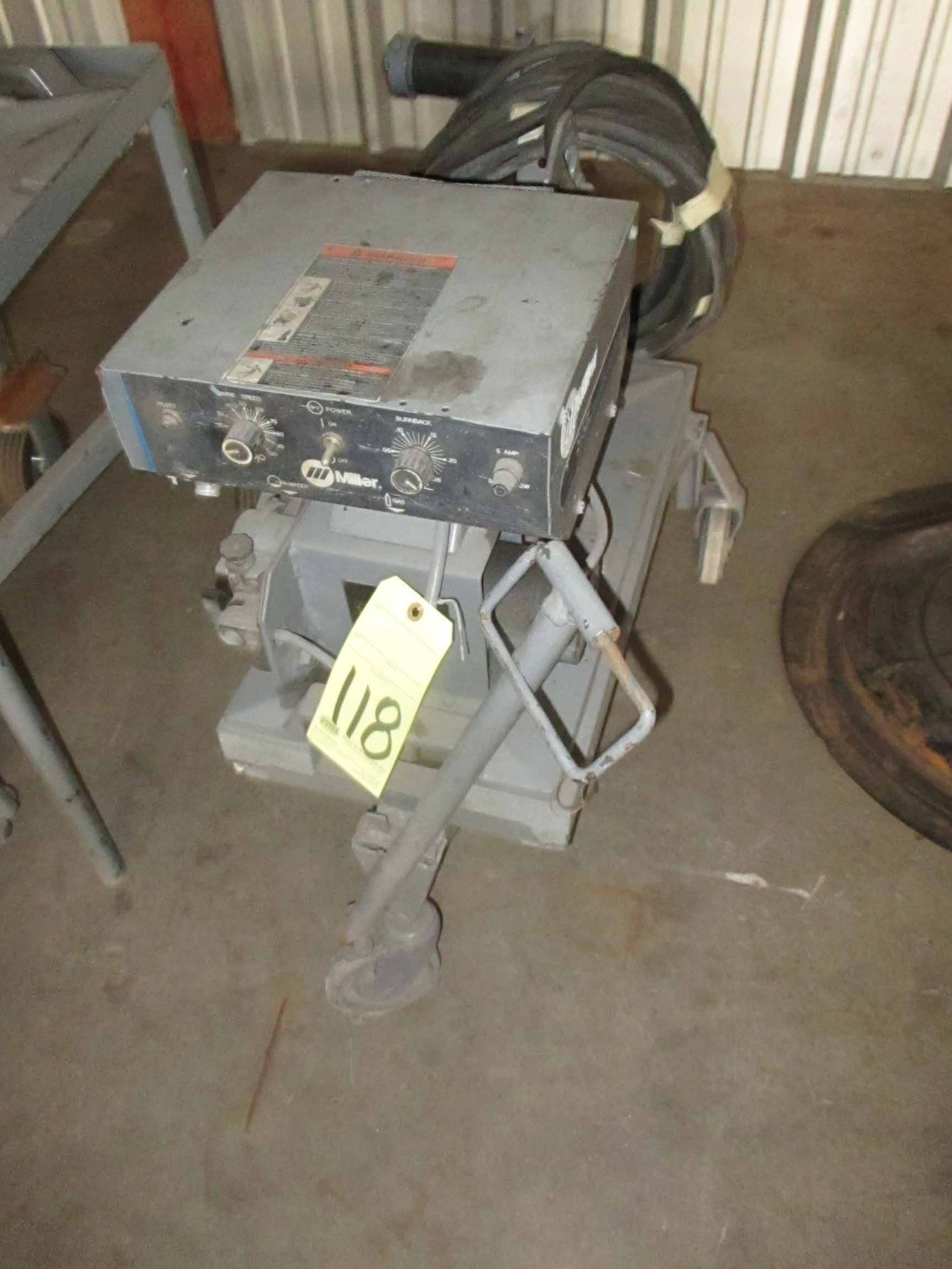 WIRE FEEDER, MILLER MDL. S-52E, on roller stand