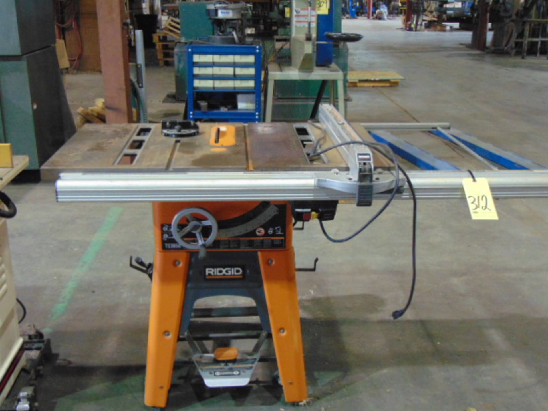 TILTING ARBOR TABLE SAW, RIDGID MDL. TS3650, roller stand, extended rip fence - Image 2 of 2
