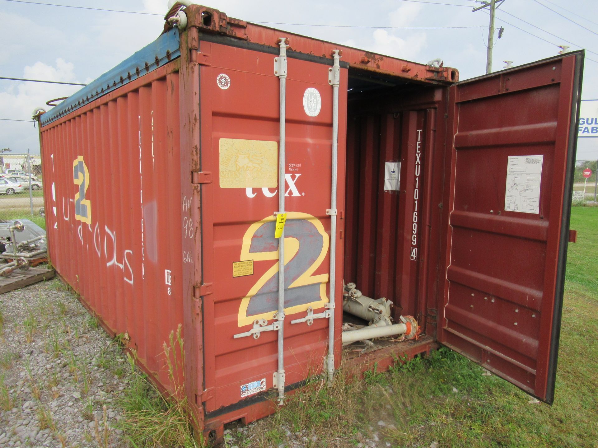 SEA CONTAINER, 20'L., tarp top, w/contents of nuts, bolts & pipe supports (tarp top in poor