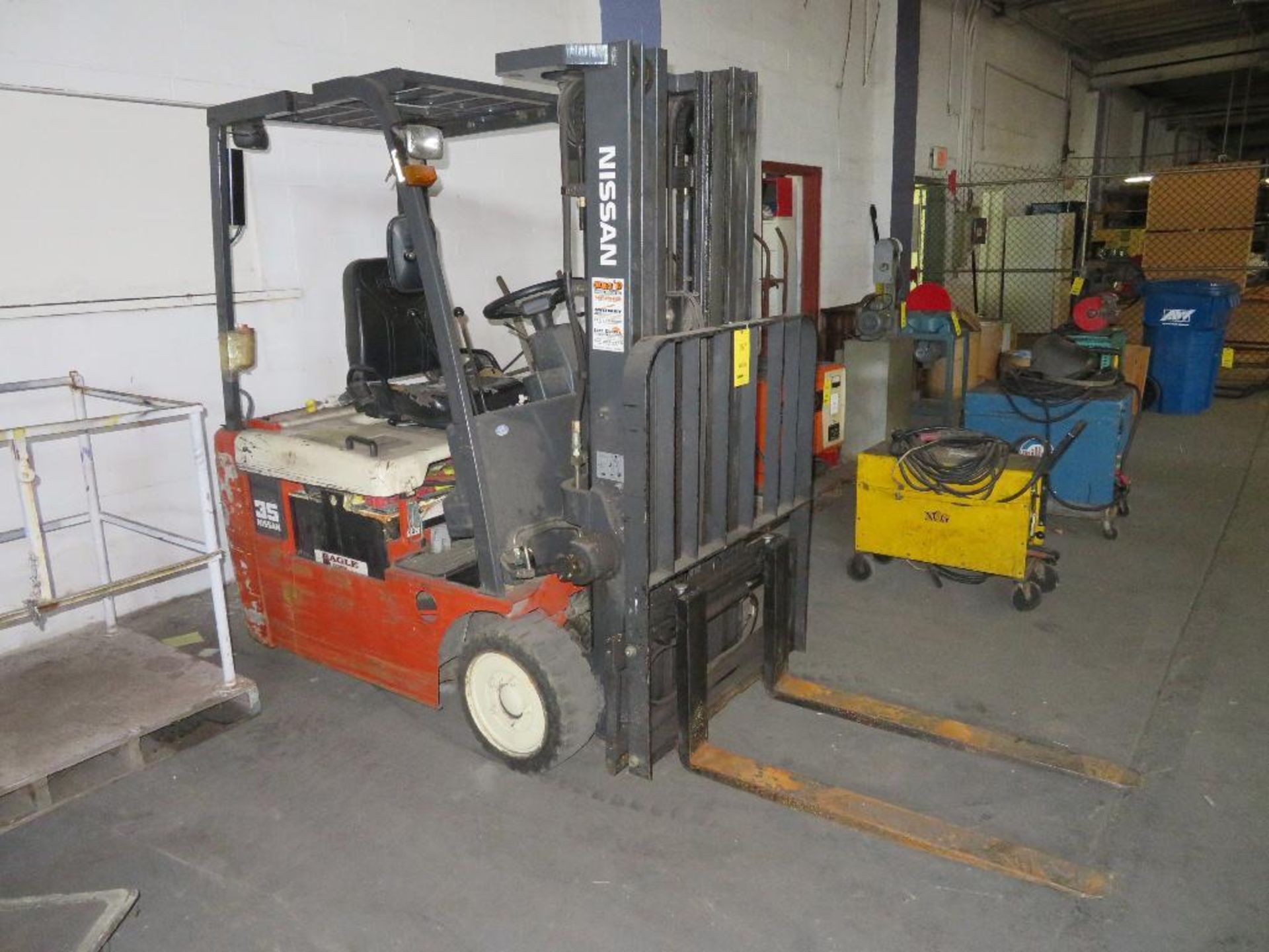 Nissan 3,500 lb. Electric Forklift, S/N NOI-720716, Solid Tires, Overhead Guard, 169” Lift of 3-Stag