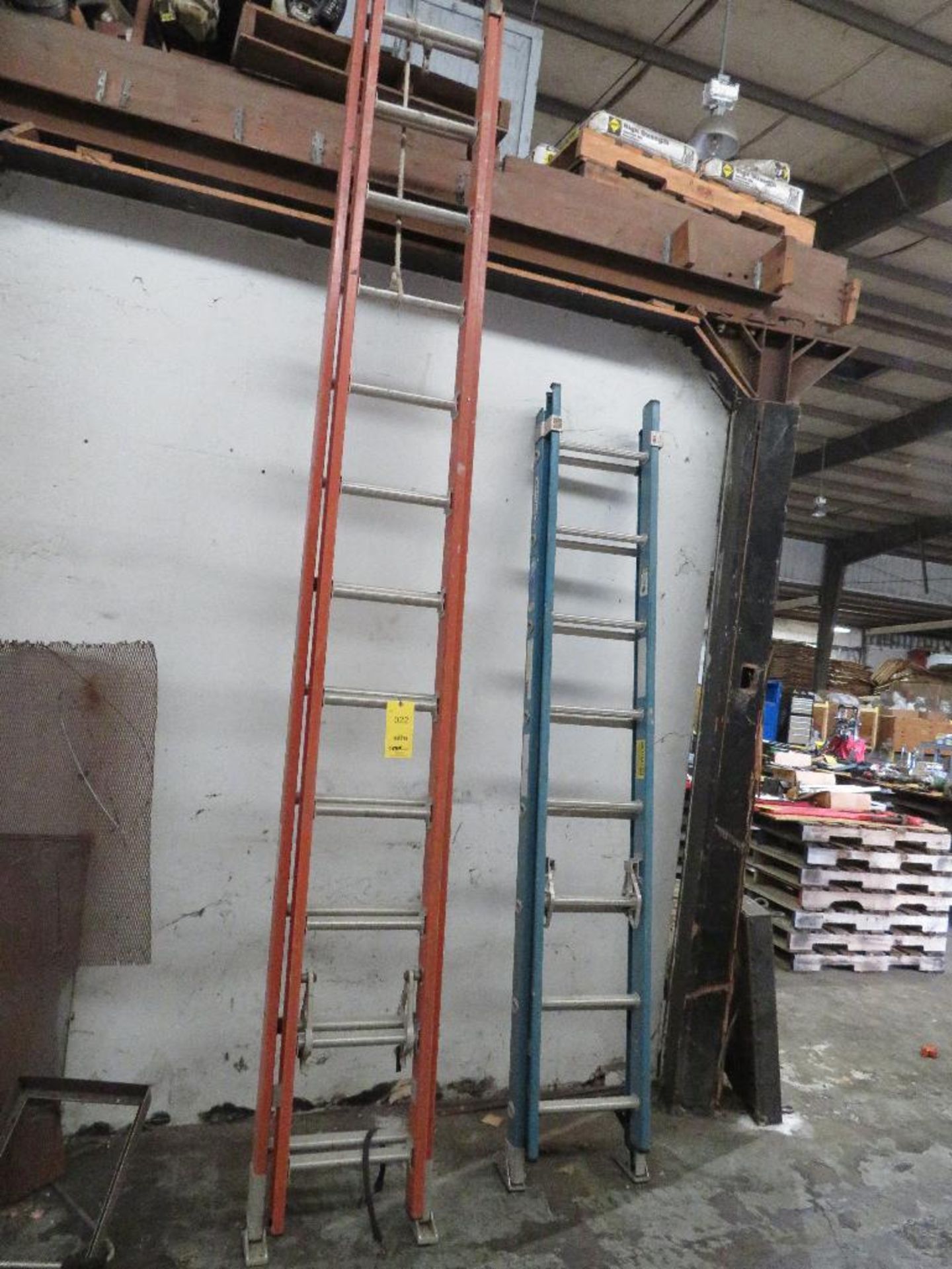LOT: (1) 16 ft. & (1) 20 ft. Extension Ladders