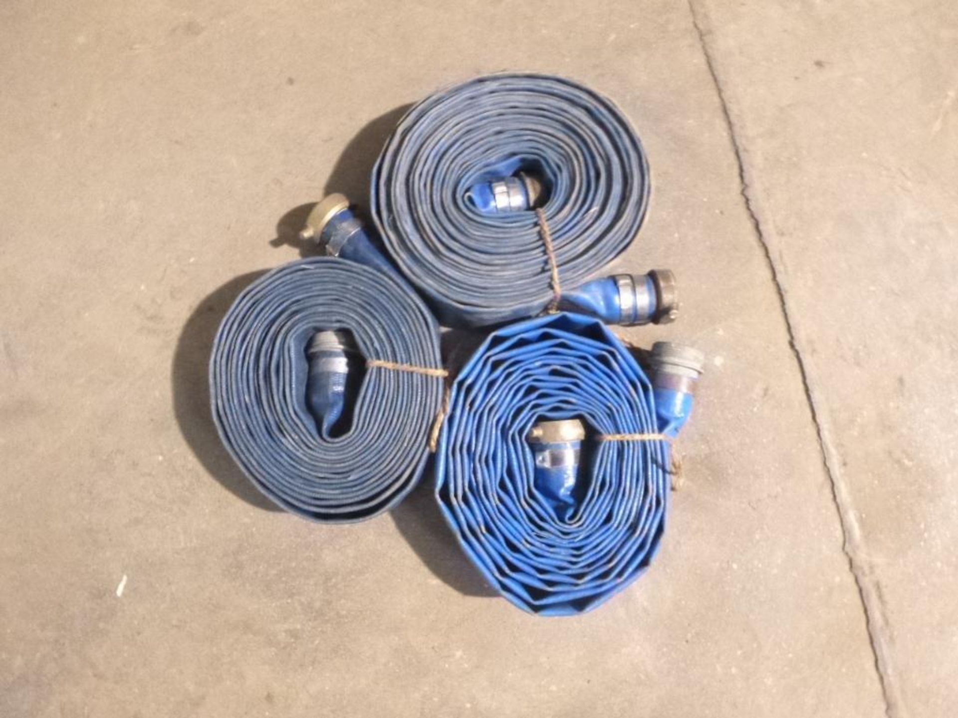 LOT: (3) 2 in. Discharge Hoses