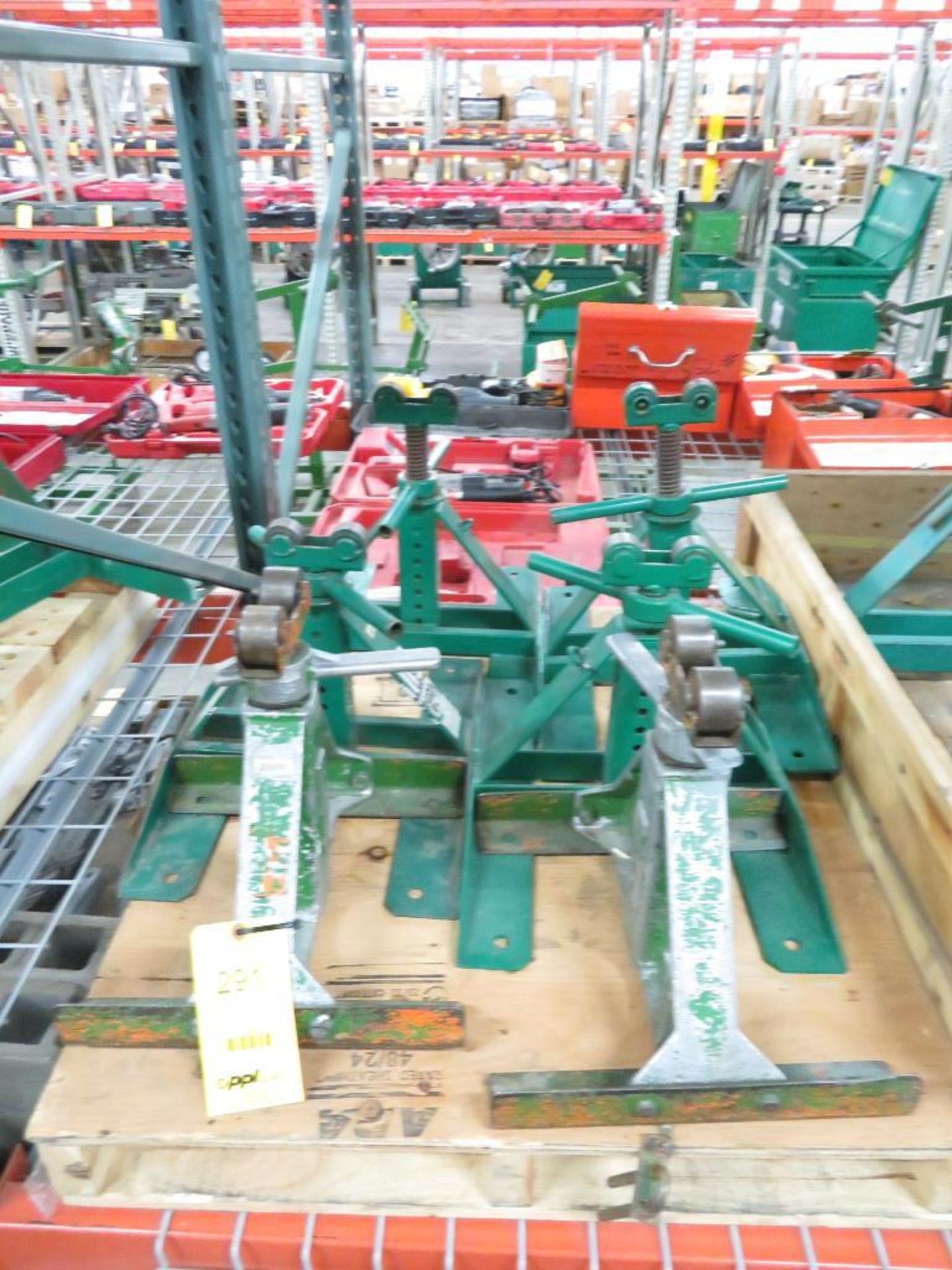 LOT: (6) Greenlee Adjustable Height Roller Top Pipe Support Stands on (2) Skids