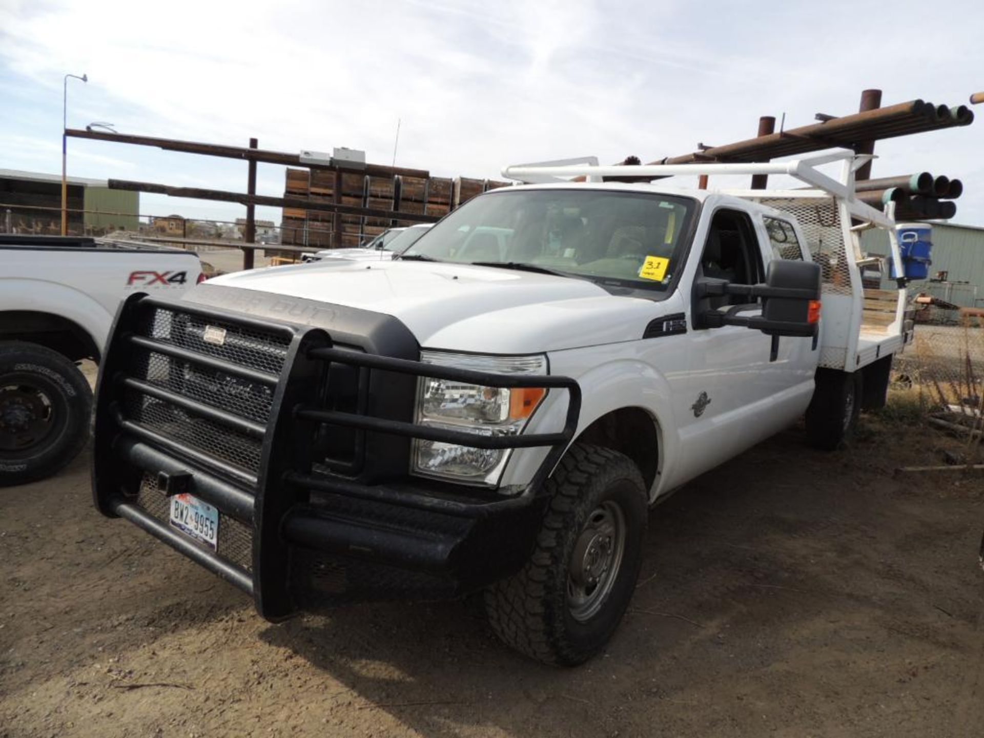 2013 FORD F250 XL SUPER DUTY CREW CAB, 9' FLAT BED, SRW, 4X4, 6.7 LTR, AUTO TRANS, 147,064 MILES IND