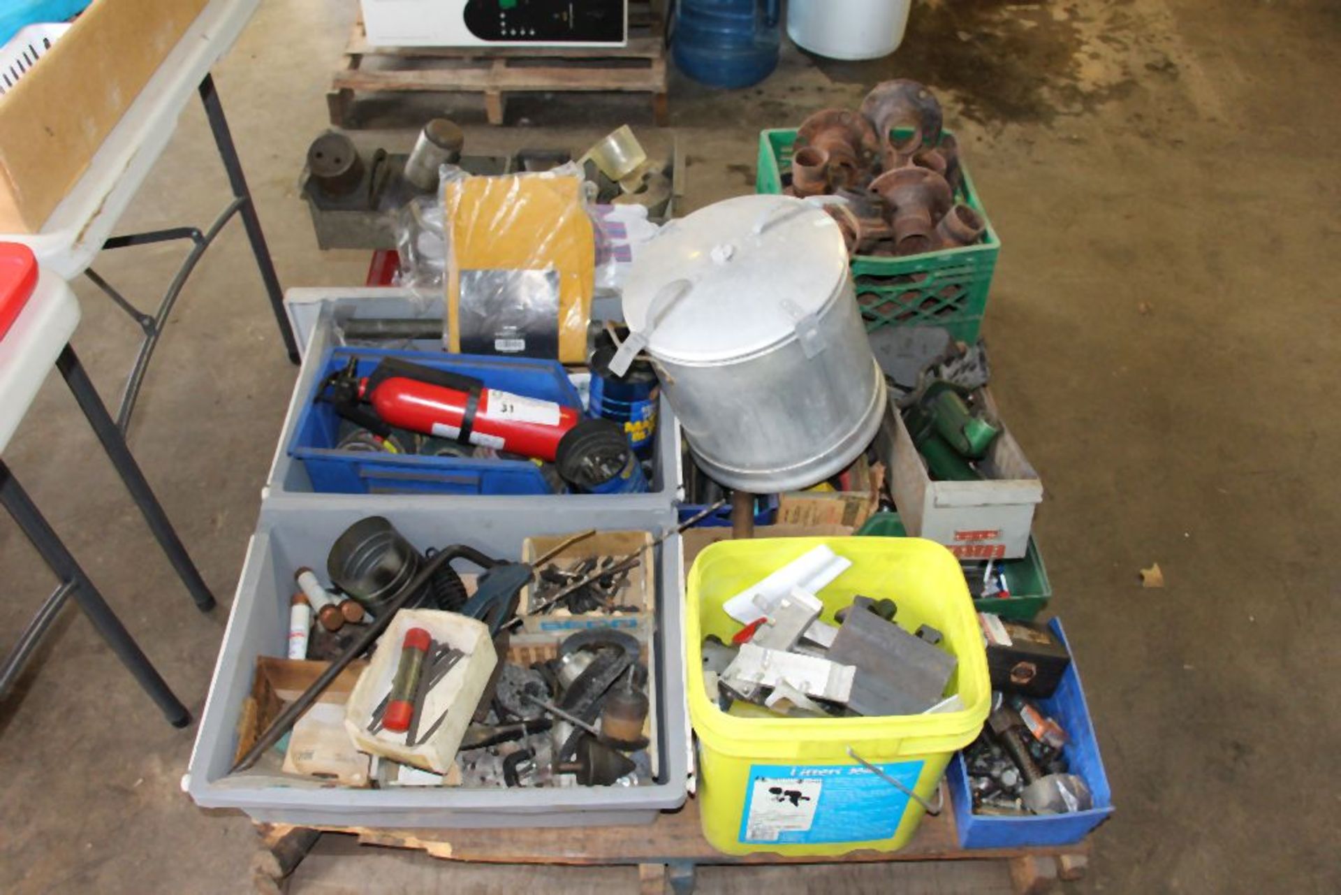 palette of assortment of grinding wheels, cutting tools, nuts, bolts, fuses, and misc.