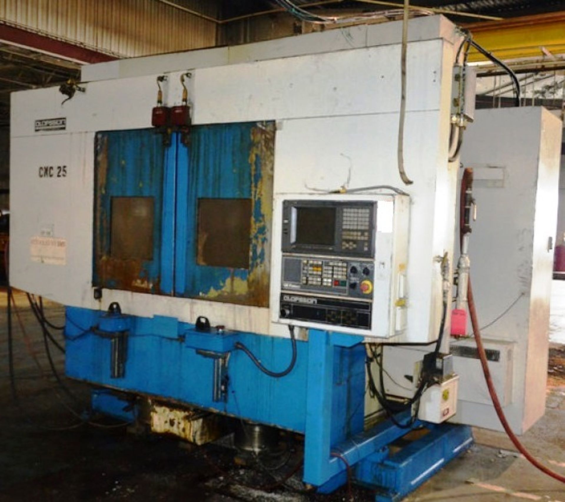 Olofsson Model M2075E Twin Spindle Vertical CNC Turning Center