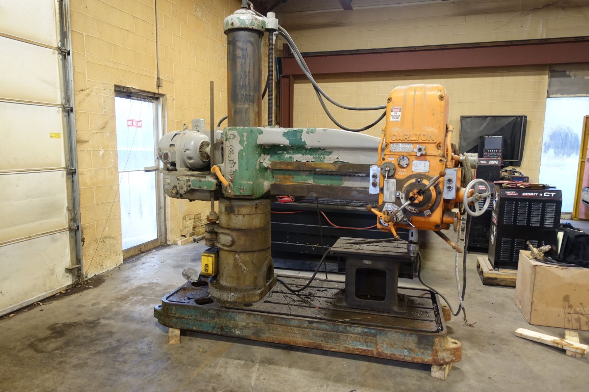 Carlton 4’ x 11” Radial Arm Drill, Box Table