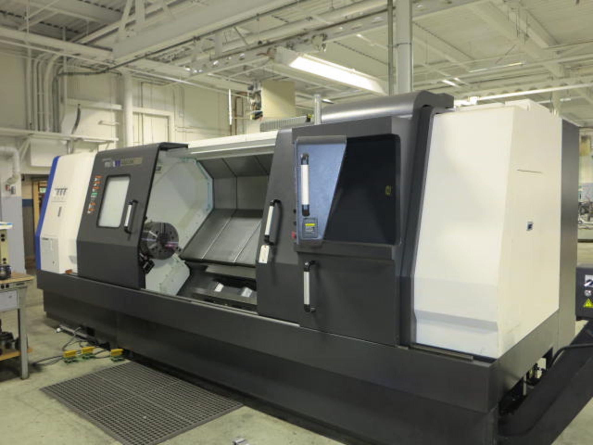 Hyundai L400LMC 3 Axis Turing Center; Fanuc Series 32i Model A Controls, Programmable Tail Stock,