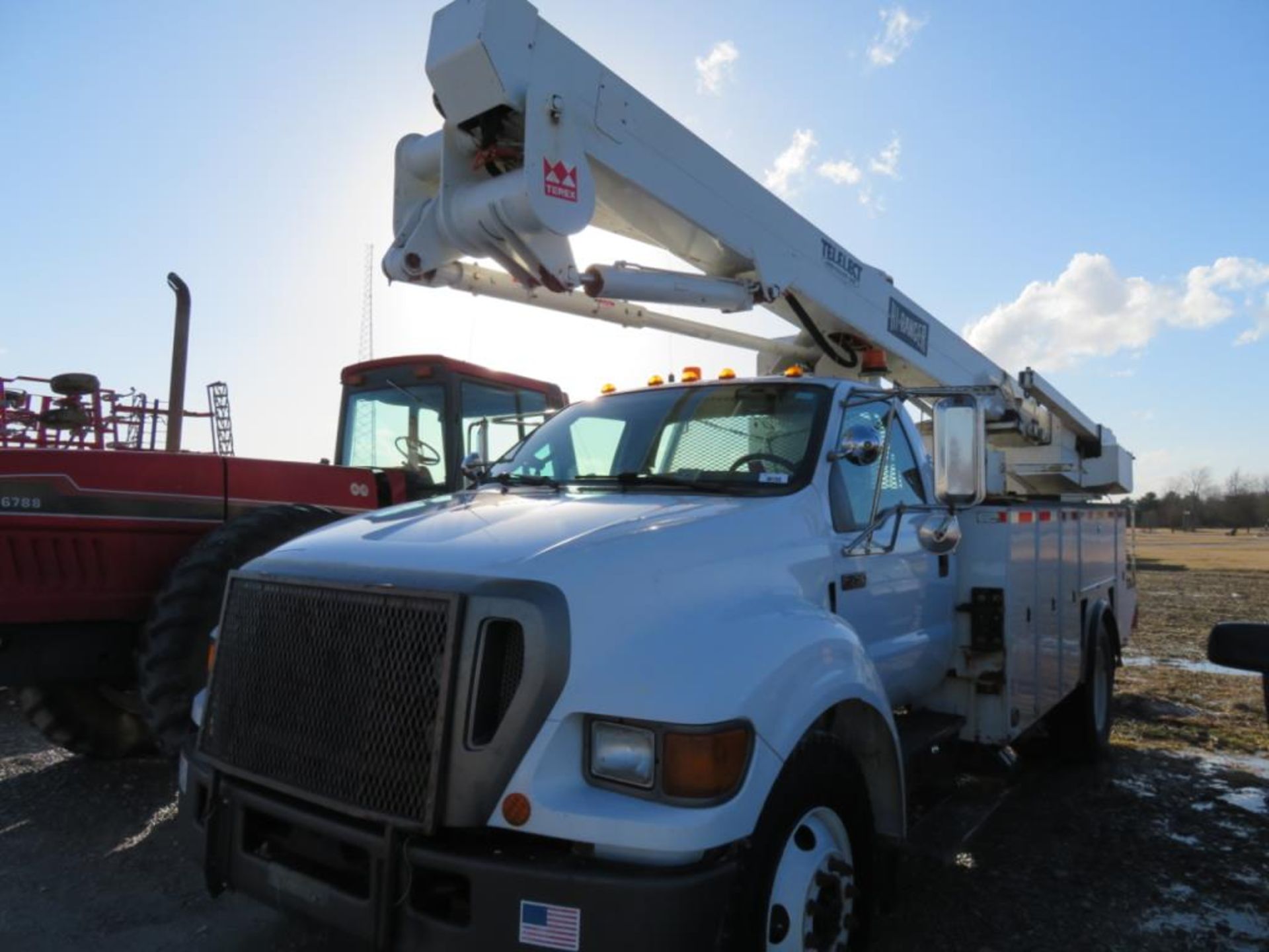 2004 Ford F750 Bucket Truck (title) Diesel, Manual Transmission, 207,763 miles33,000 GVWR, runs