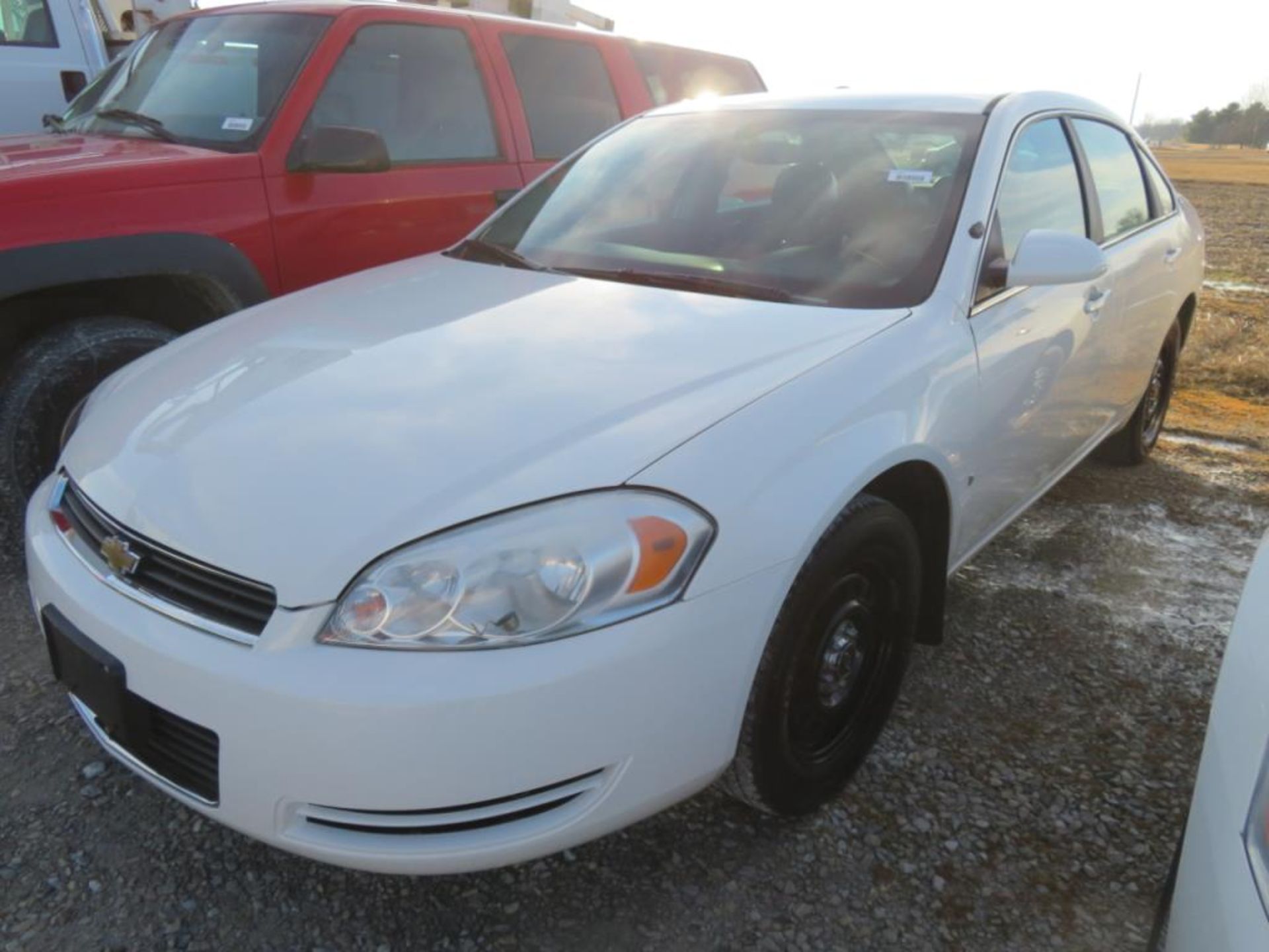 2008 White Chevy Impala (title) just over 100,000 miles, was a police car vin, 2G1WS553681373993,