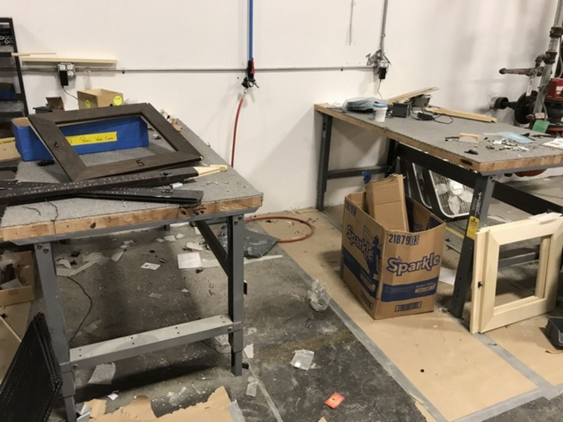 CARPETED WORK BENCHES WITH WOOD TOPS