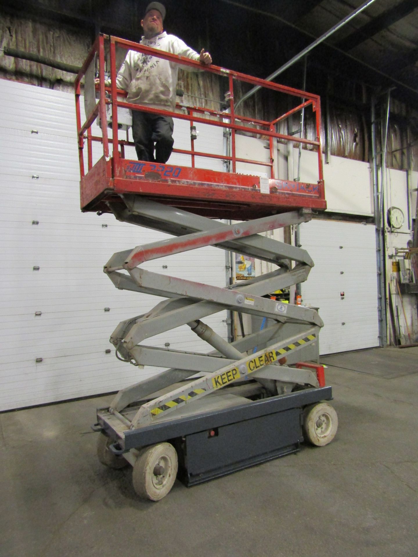 SkyJack III Electric Scissor Lift model 3220 - 20 feet lift, 32 inch width deck with pendant