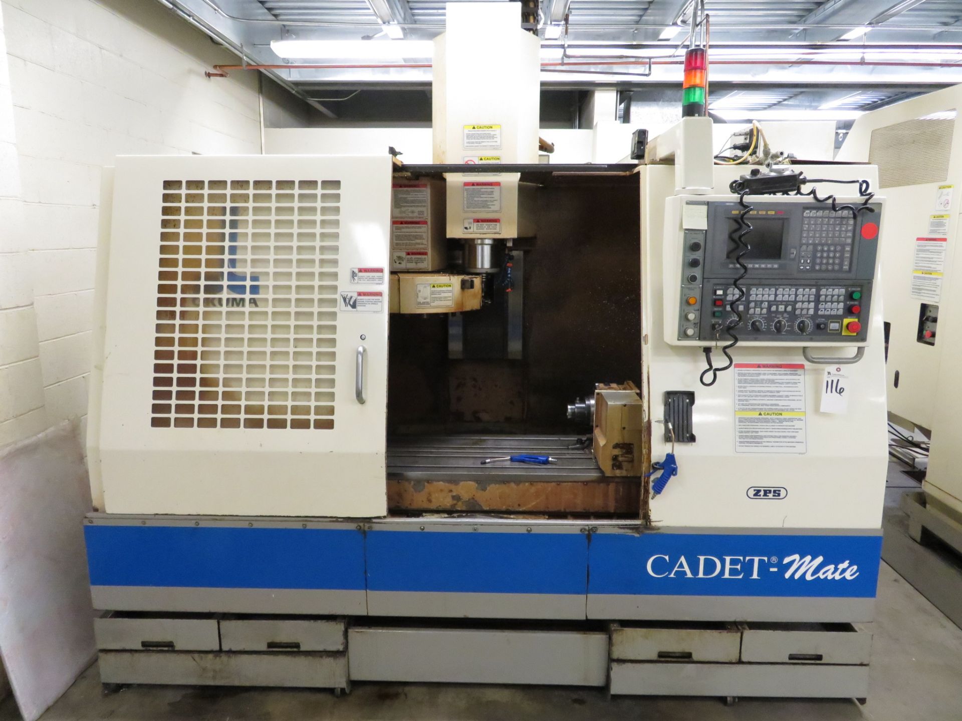 Okuma mod. CadetMate 4-Axis Vert. Machine Center 4th Axis Indexer, A.T.C OSP700L Controls; S/N 0158