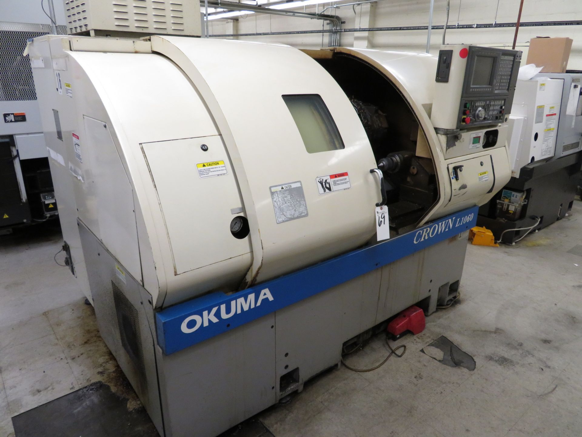 Okuma mod. Crown L1060 Type 762E CNC Turning Center, 12-Position Turret, Tailstock, 3-Jaw Chuck,