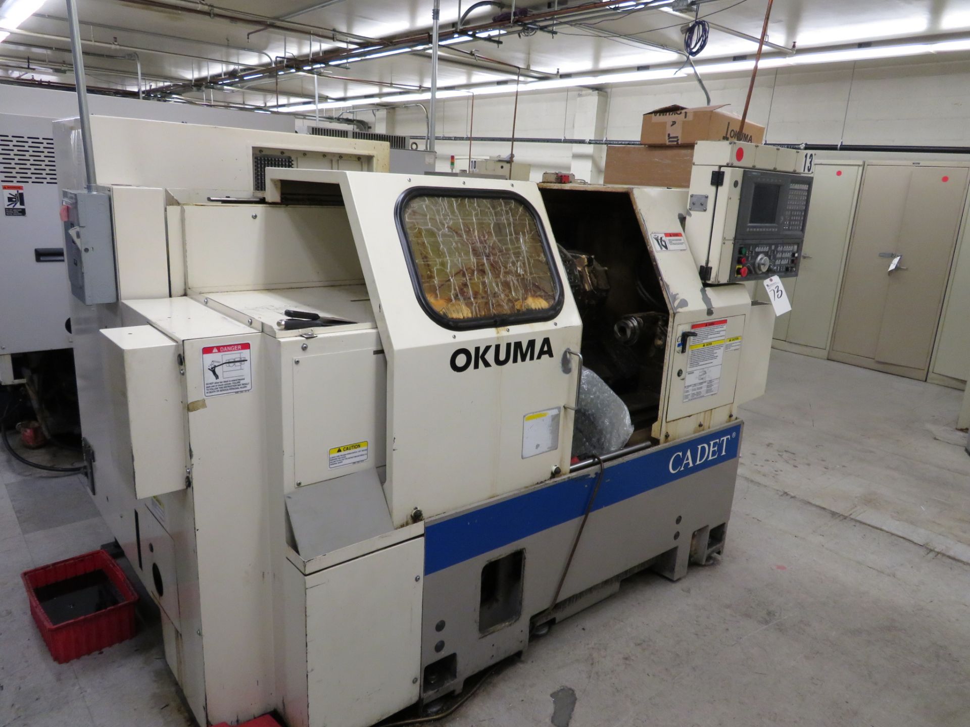 Okuma mod. Cadet LNC-8 CNC Turning Center, Tailstock, 12-Position Turret, 3-Jaw Chuck, OSP 700L