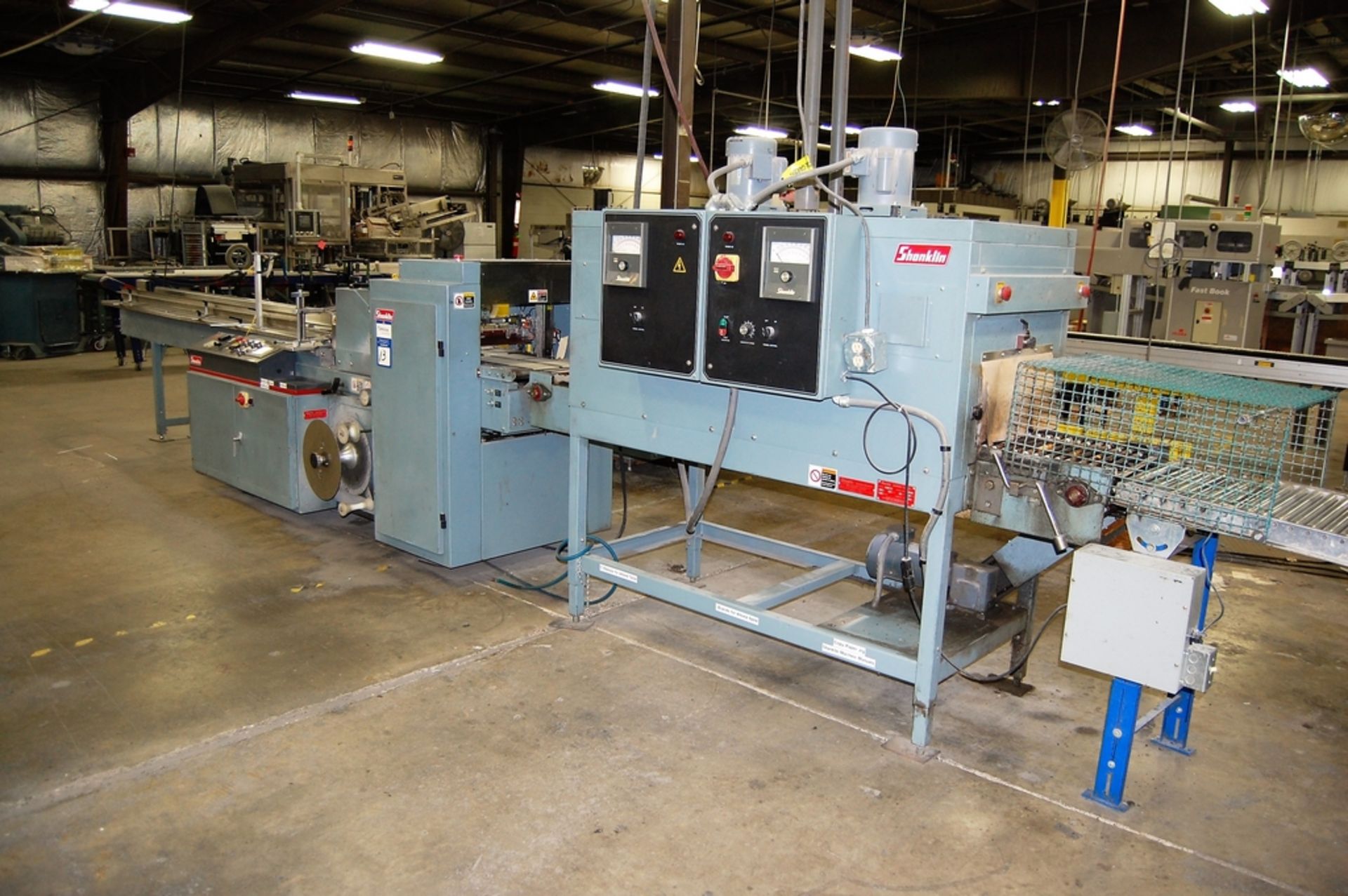 2002 Shanklin Model T-62 High Speed Dual Chamber Shrink Wrapper, Centerfolder and Shrink Tunnel - Image 2 of 12