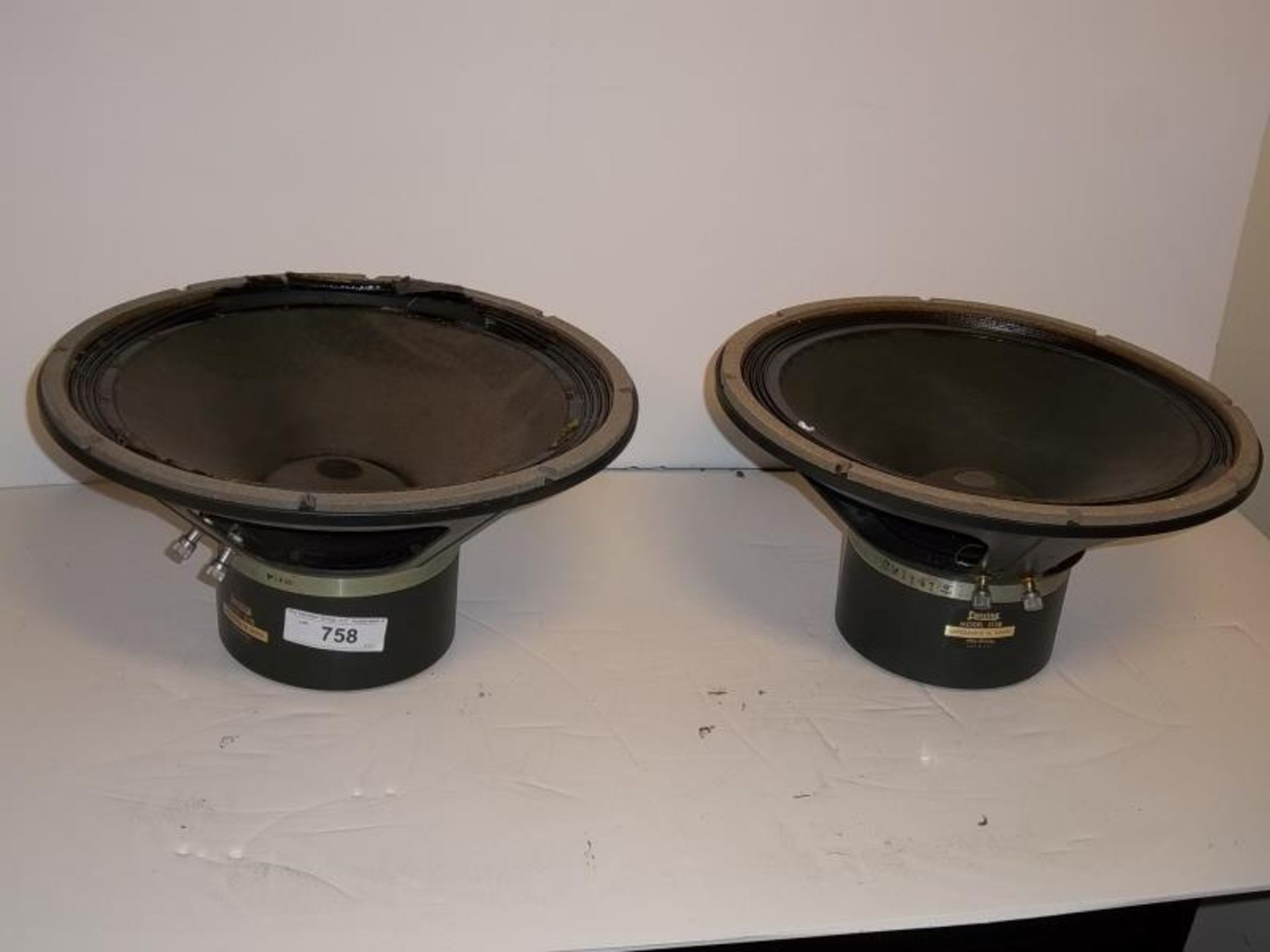 2 Altec Lansing , Annaheim, CA, model 515B loud speakers, 15", 16" ohms, one cone damaged, both
