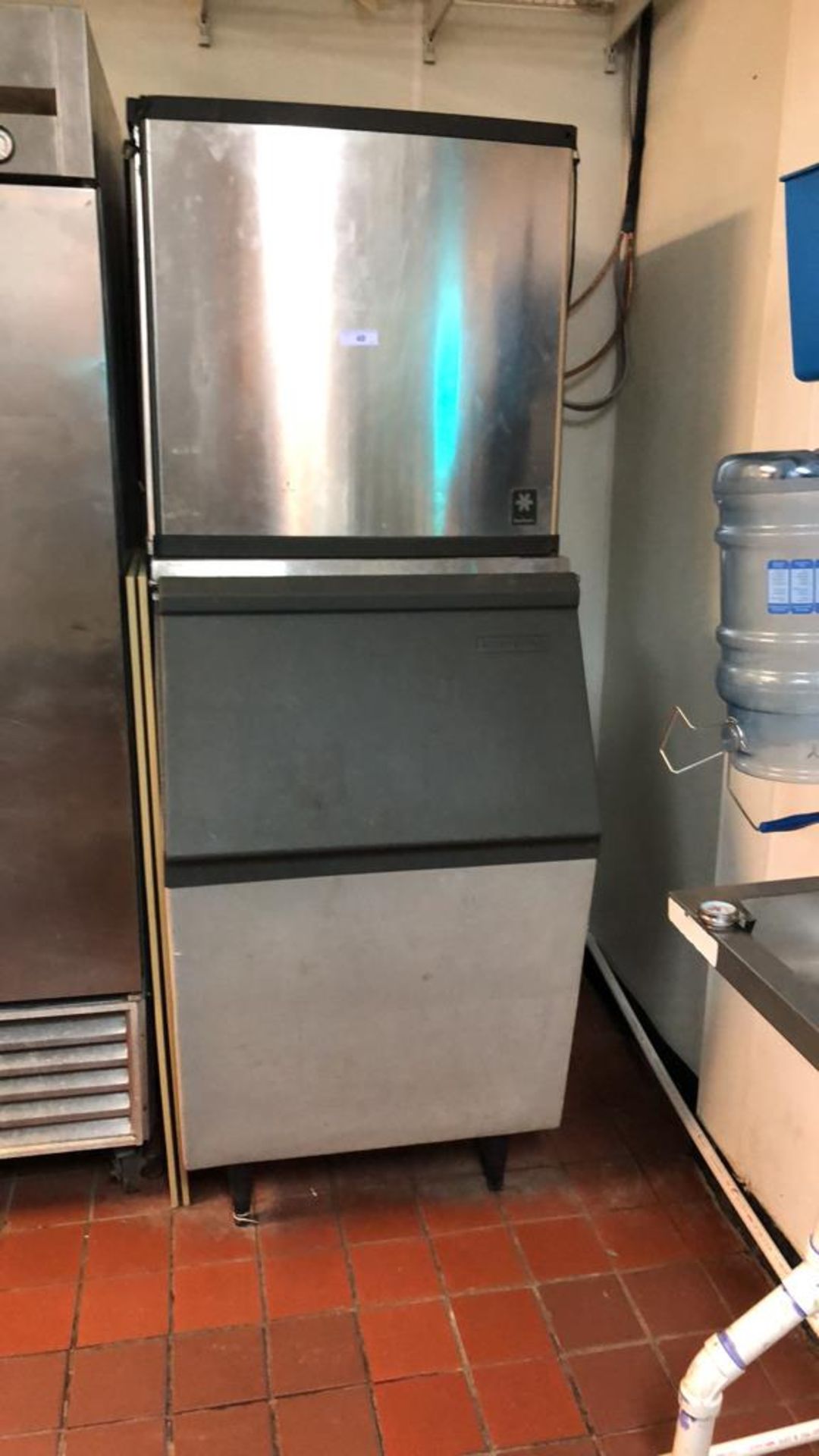 Manitowoc ice machine with the Scotsman base, remote compressor, Model: QY1094N, SN: 020160670