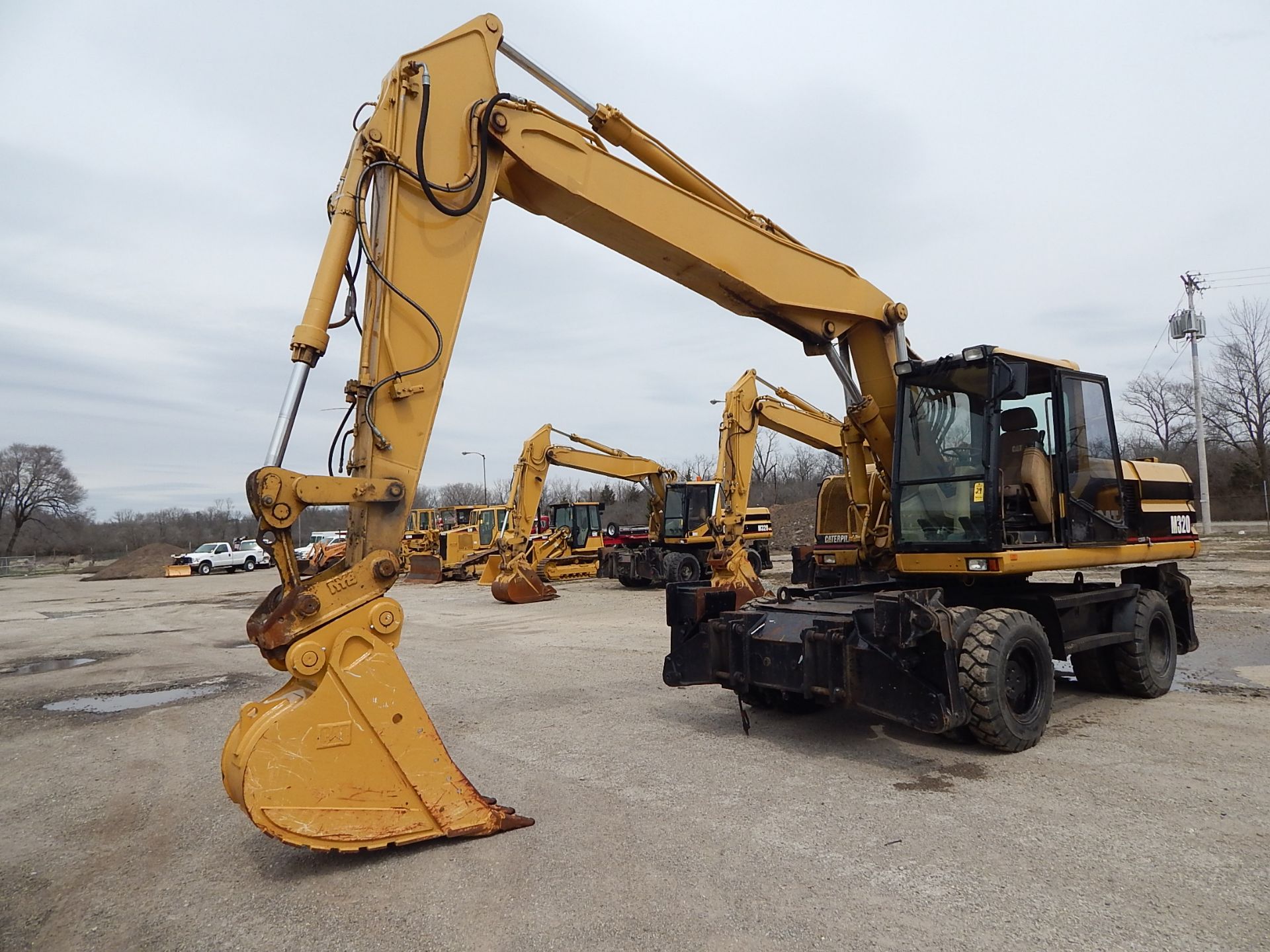 2001 Caterpillar Model M320 Mobile Excavator SN 06WL00647, (4) Outriggers, Dual Tires, Enclosed Cab,