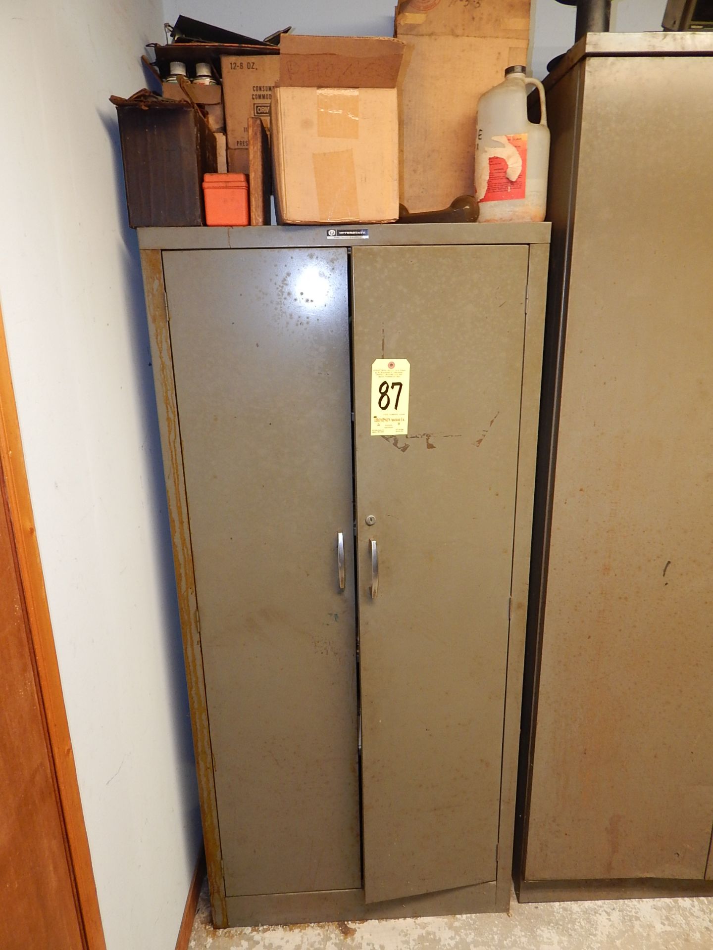 2-Door Metal Storage Cabinet and Contents