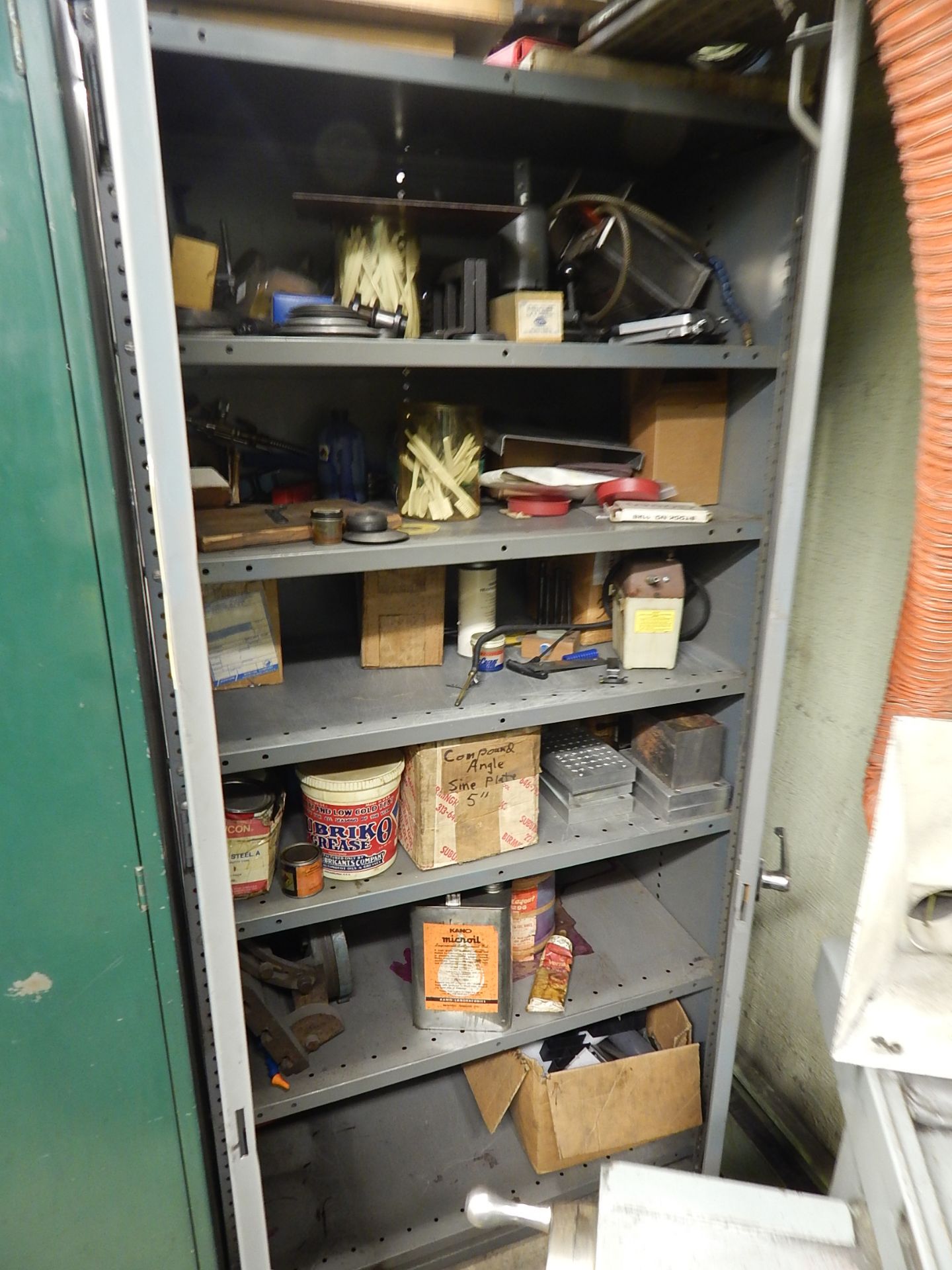 2-Door Metal Storage Cabinet and Contents