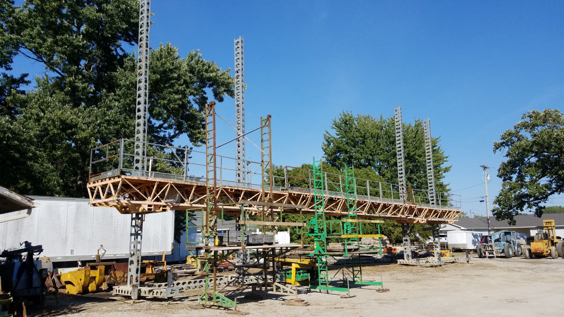 (2) Bennu Hydraulic Mast-Climbing Scaffolding Platforms w/Bridge 34’ x 7’, Load Capacity 20,000,