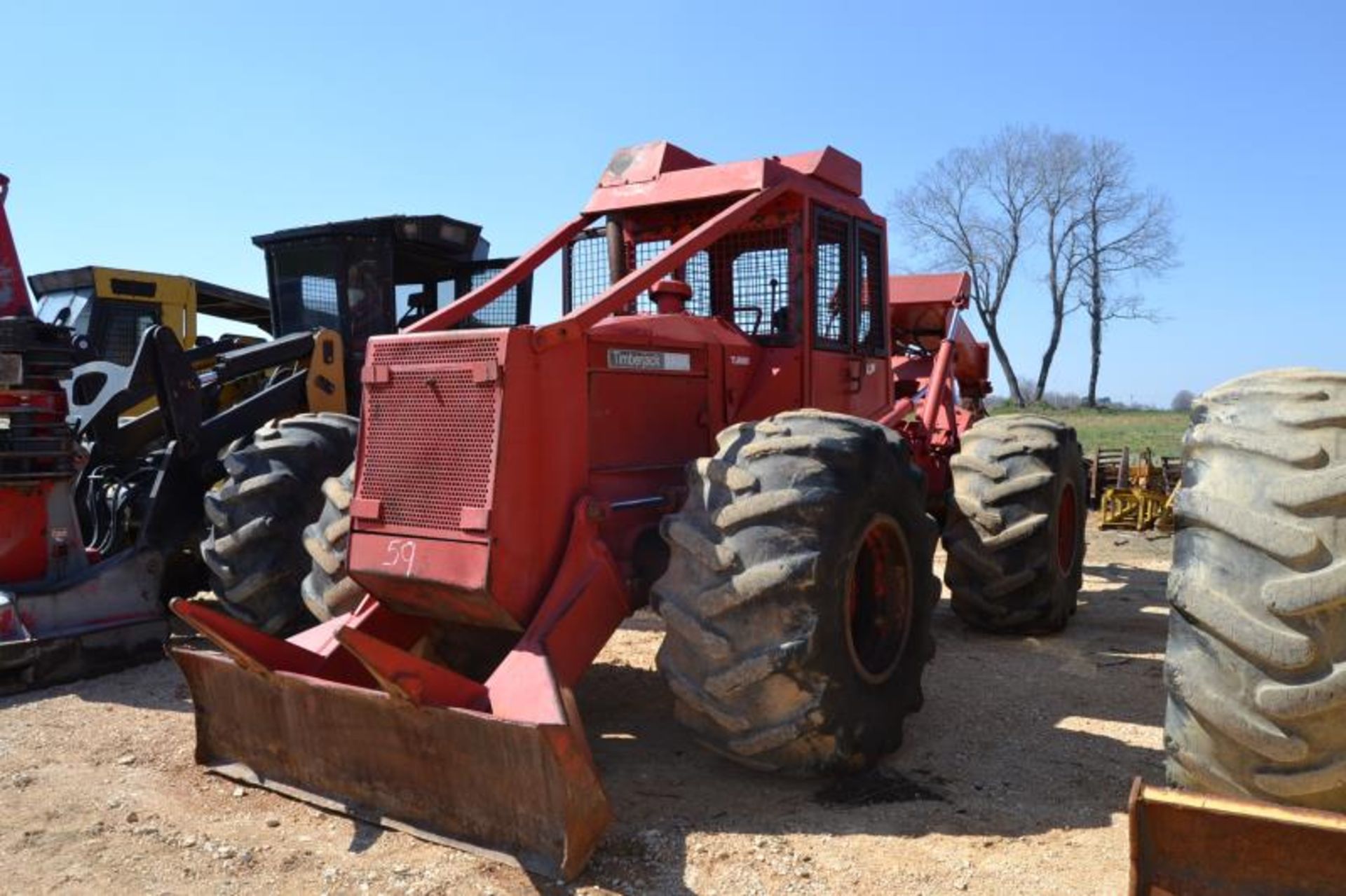 TIMBERJACK 380A DOUBLE ARCH GRAPPLE SKIDDER W/CUMMINS ENGINE (HAS CRACK IN ENGINE BLOCK) 28LX26