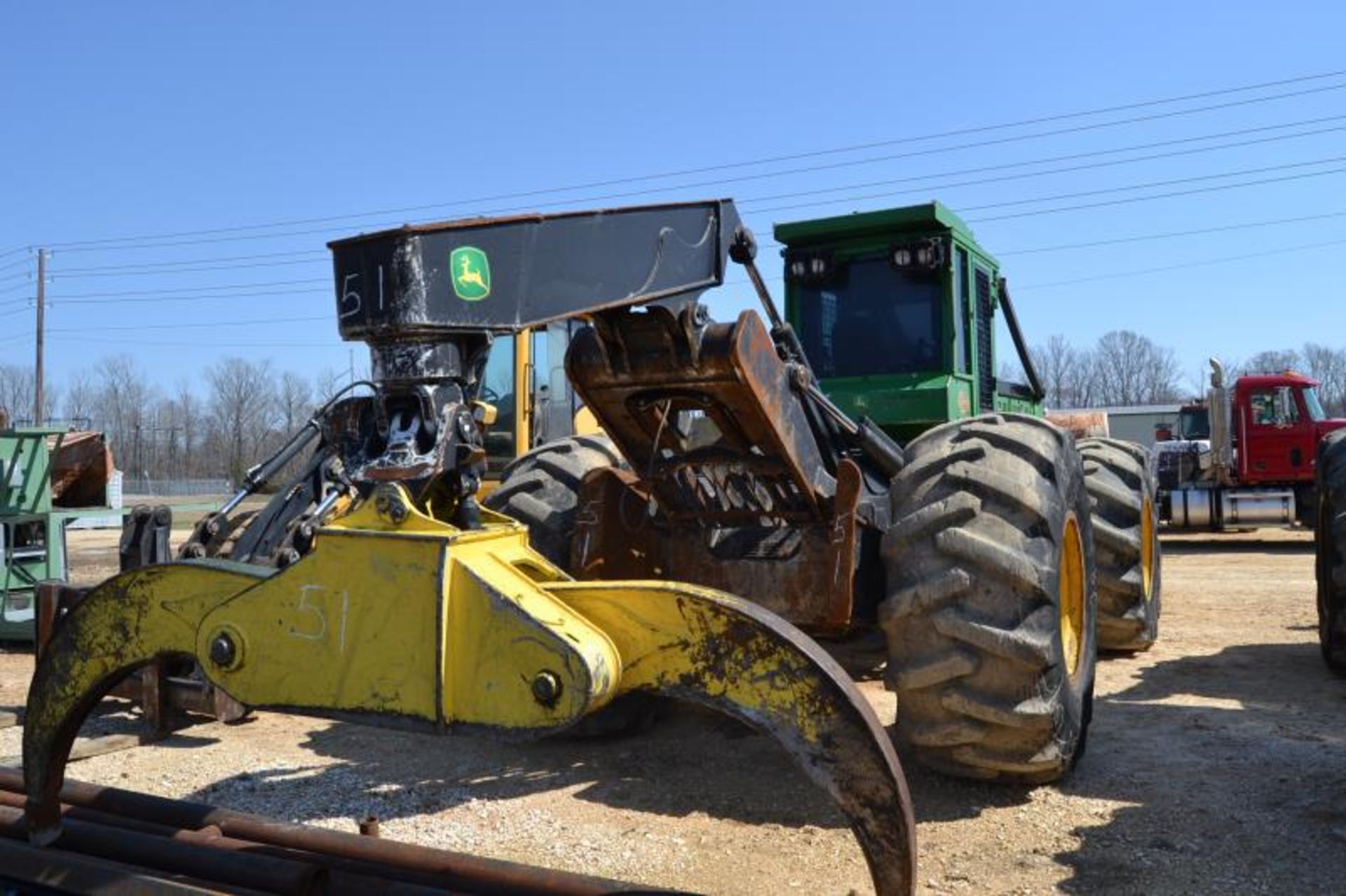 JOHN DEERE 648H DOUBLE ARCH GRAPPLE SKIDDER W/WINCH; W/30.5X32 RUB; W/12185 HOURS SN# 617974