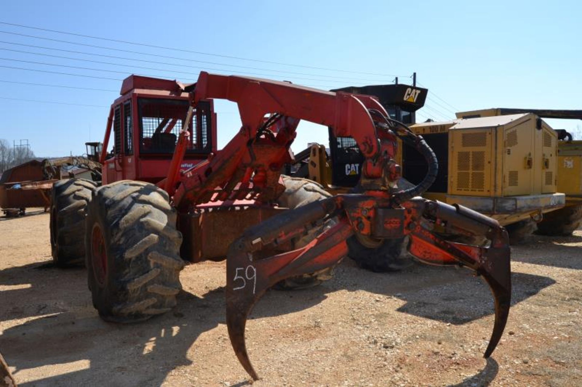 TIMBERJACK 380A DOUBLE ARCH GRAPPLE SKIDDER W/CUMMINS ENGINE (HAS CRACK IN ENGINE BLOCK) 28LX26 - Image 2 of 3