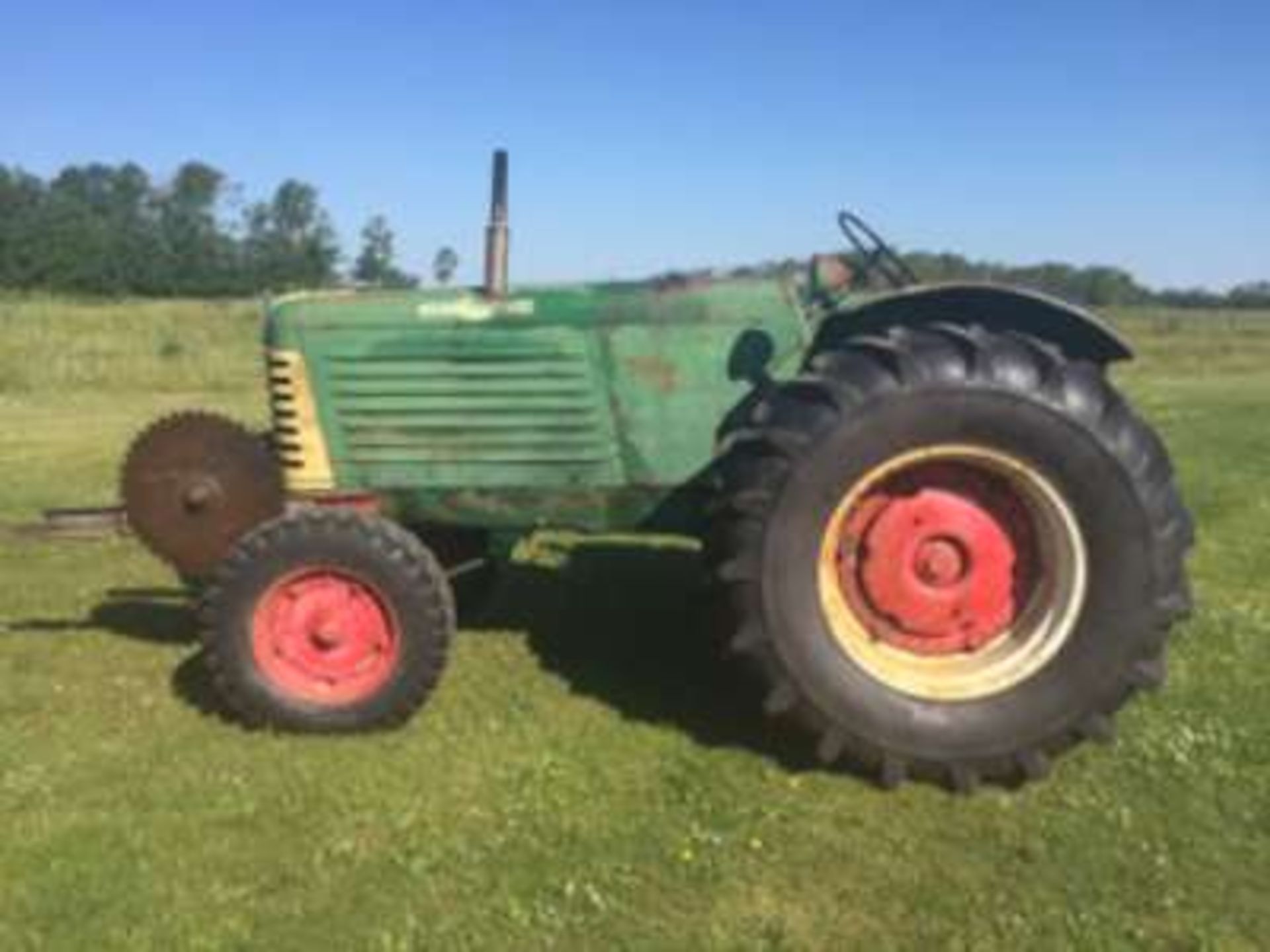 Oliver 88 diesel tractor, brand new tires w/mounted wood saw